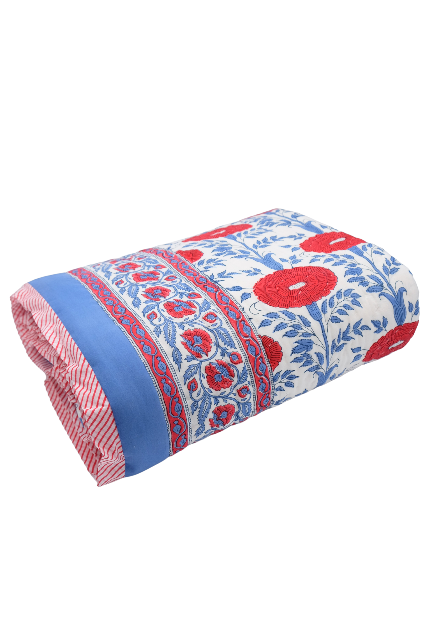 Rolled reversible cotton quilt with colorful block prints