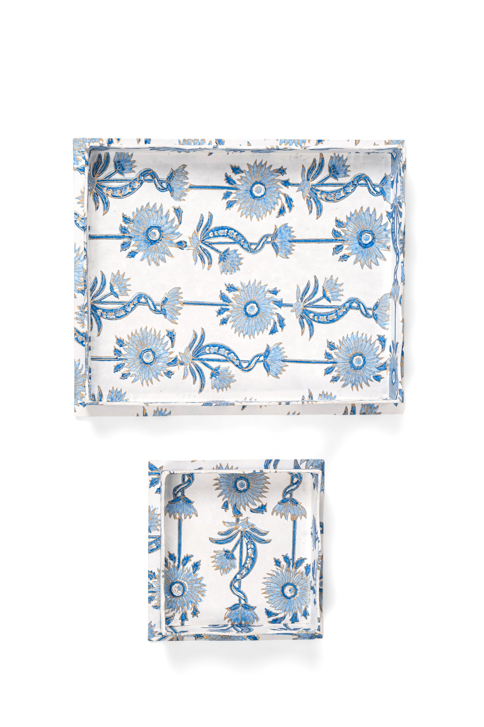 Blue nesting scalloped blockprint trays with floral vine patterns stacked vertically from Inner Child