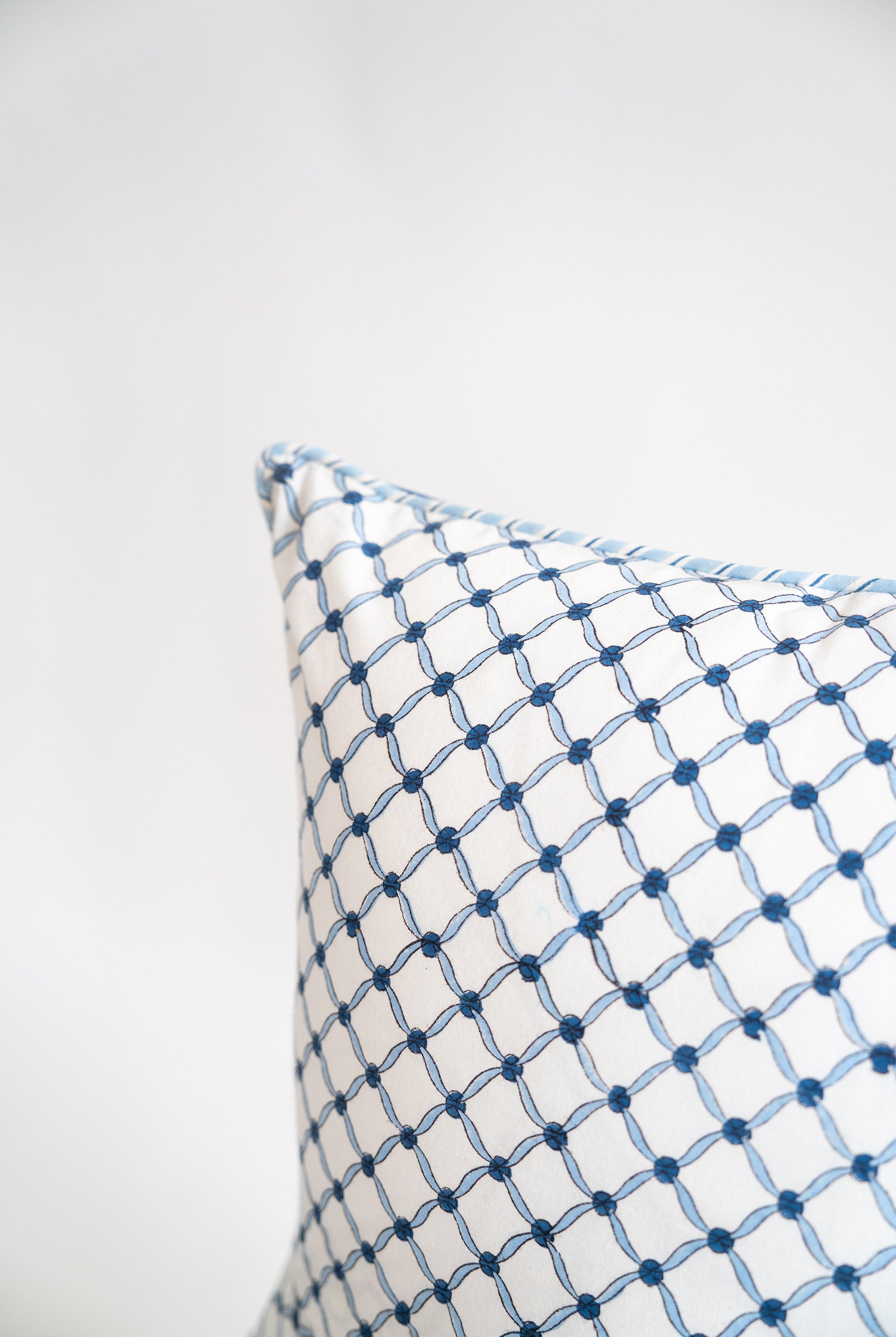 Cobalt botanical blockprint pillow with geometric pattern