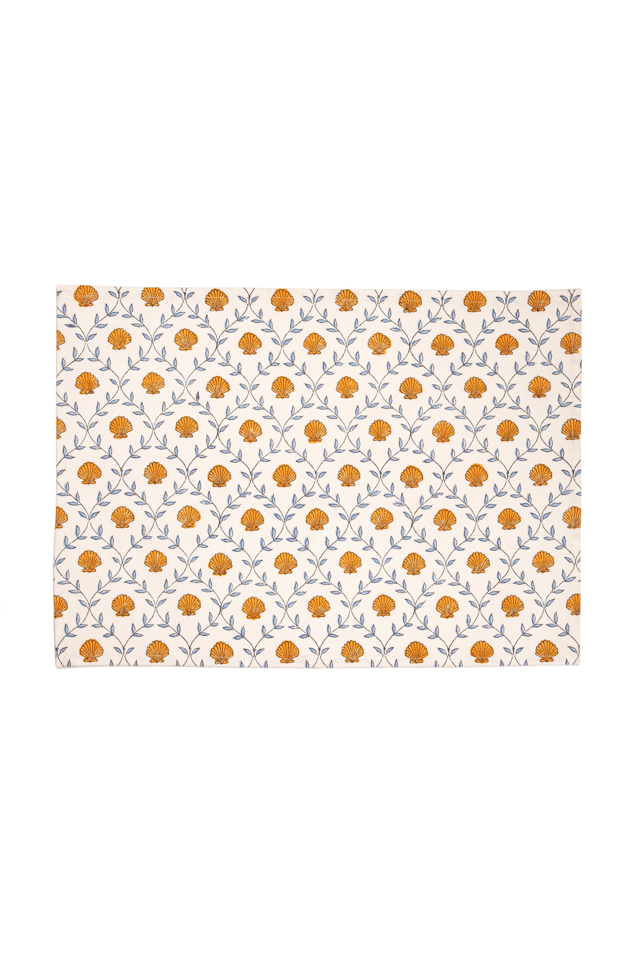 Orange seashell blockprint placemat from Inner Child