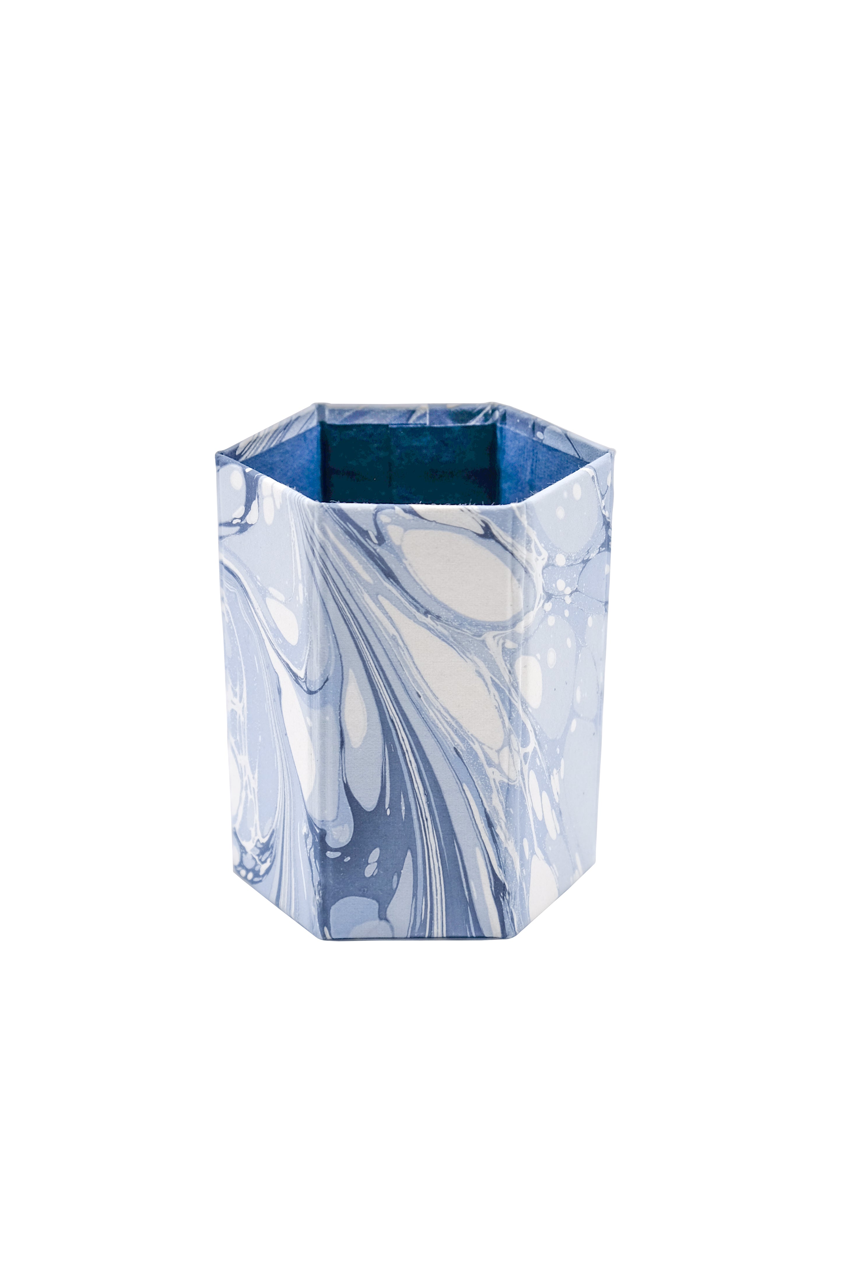 Empty hexagonal hand-marbled pencil holder from Inner Child in ocean wave design
