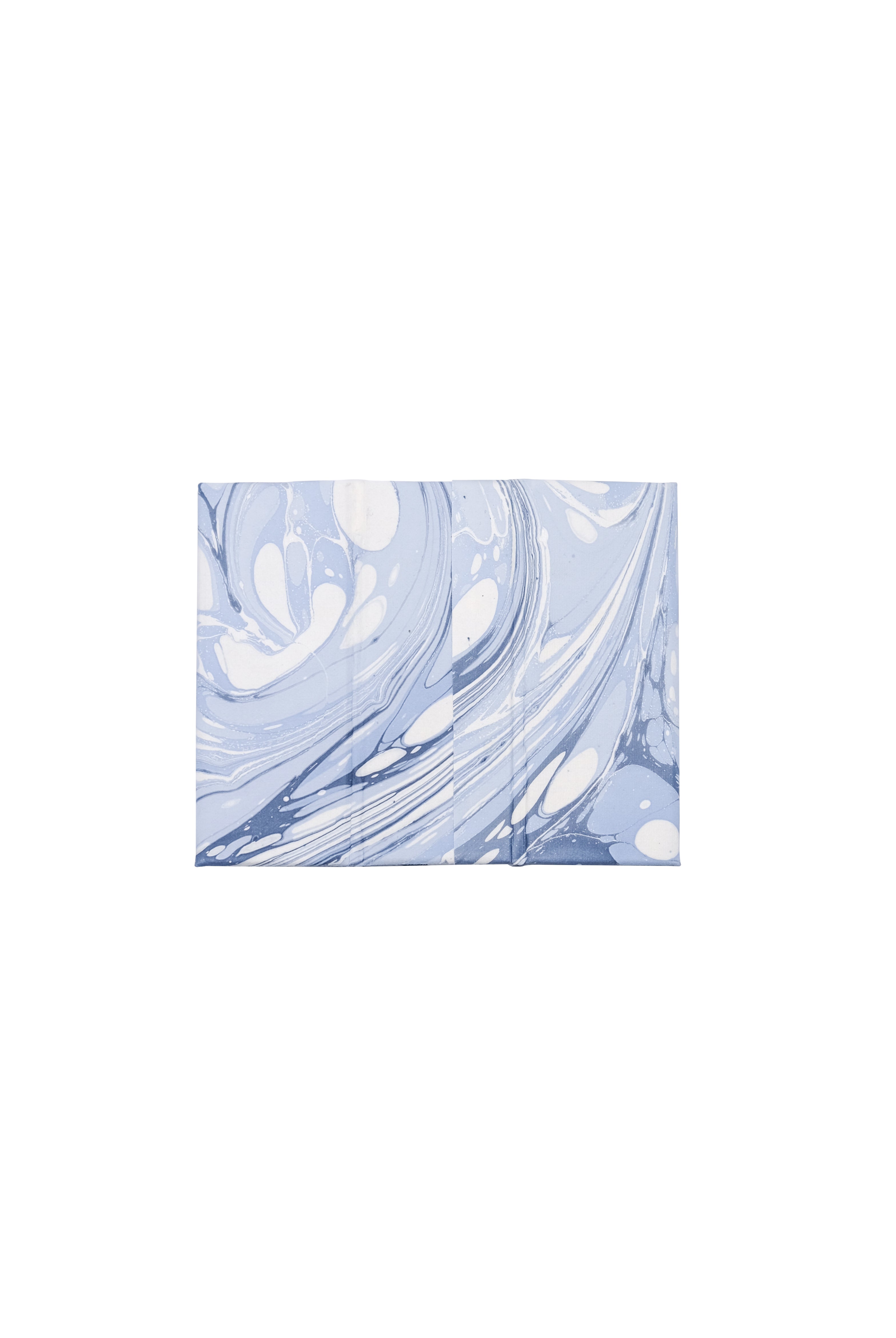 Close-up of hand-marbled fabric with ocean wave design from Inner Child