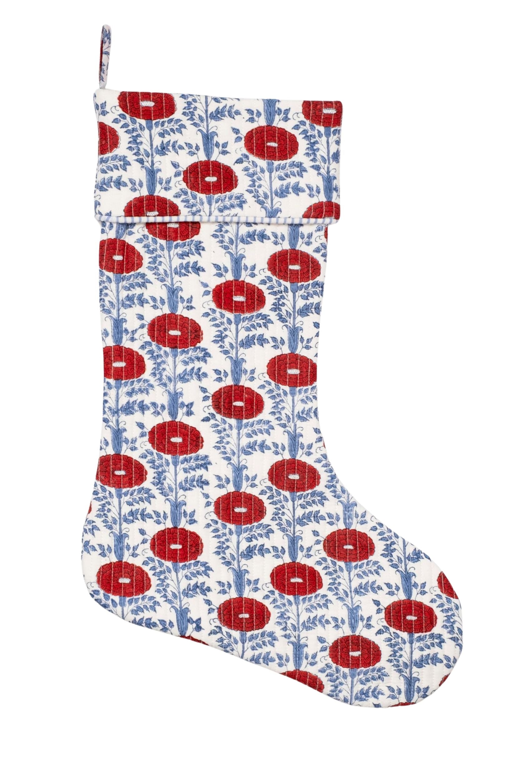 Inner Child Araminta Red blockprint Christmas stocking with vibrant red floral patterns and blue foliage on white fabric