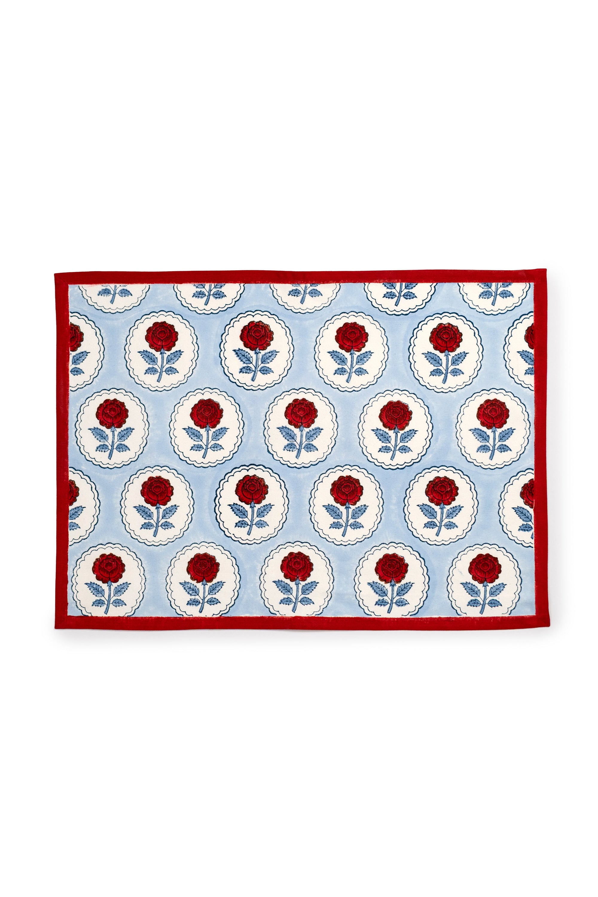 English Rose blockprint placemat blue background red roses white circular patterns red border