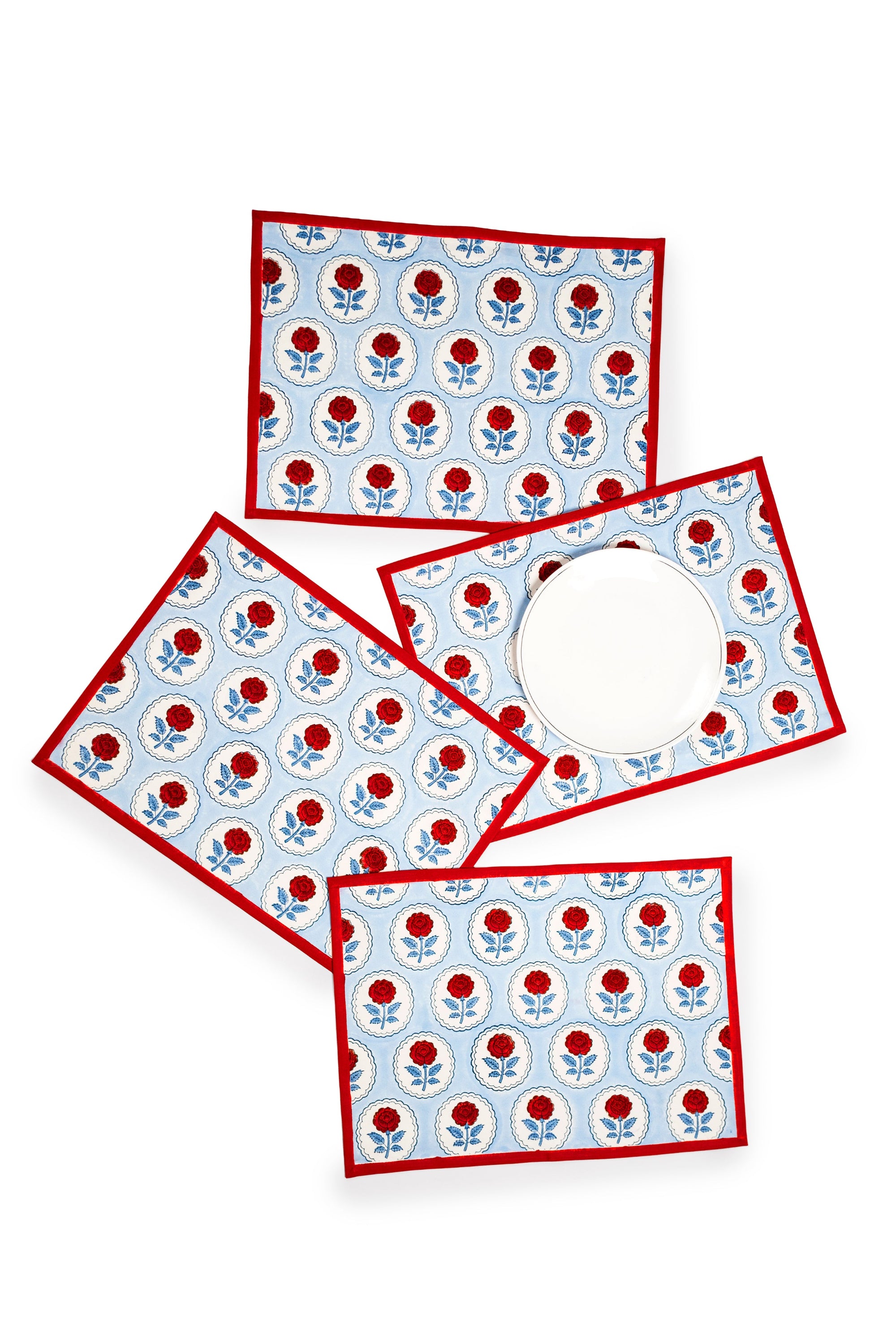 Set of English Rose blockprint placemats blue/red floral patterns multiple pieces arranged
