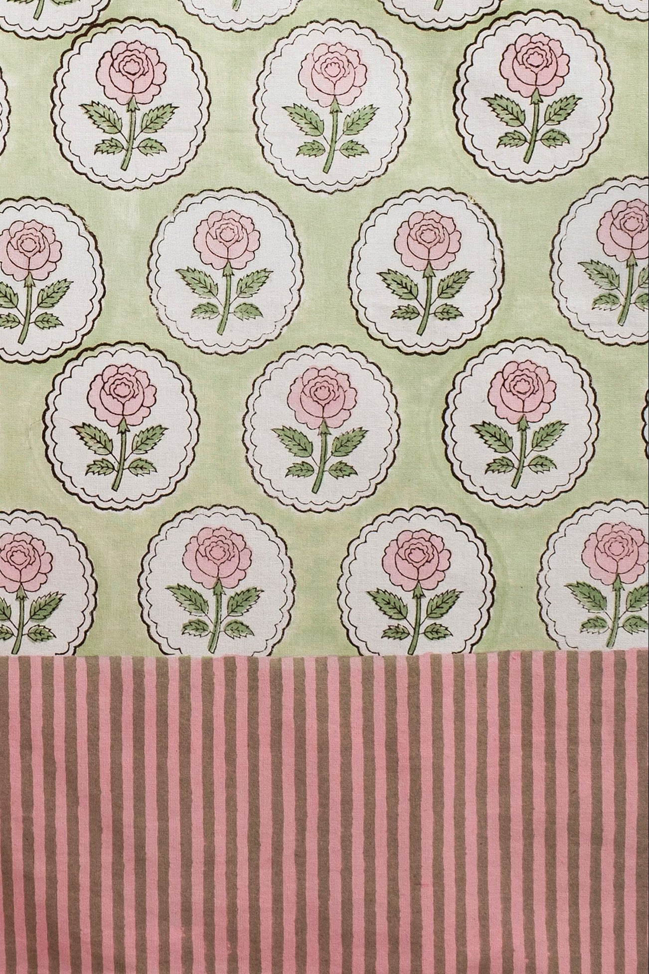 Inner Child pink rose blockprint tablecloth with green accents and striped border