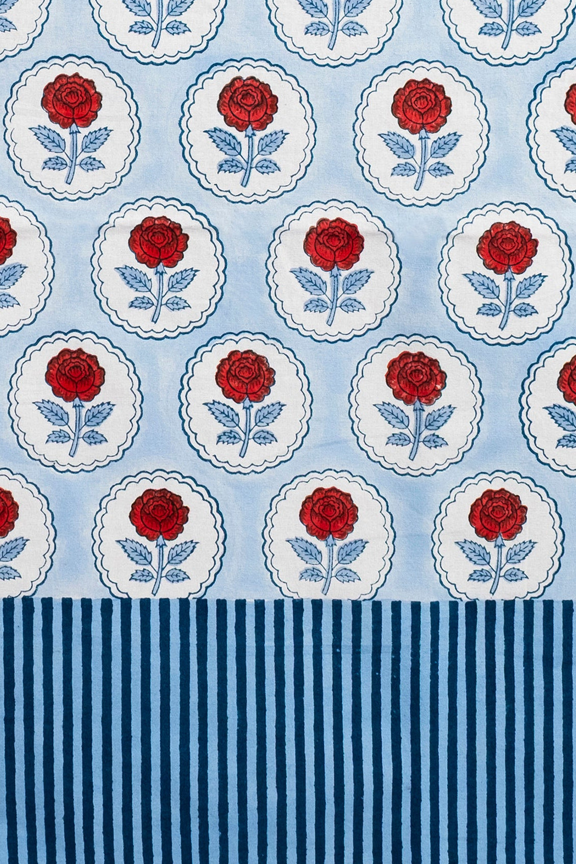 Inner Child red rose blockprint tablecloth with blue background and striped lower section