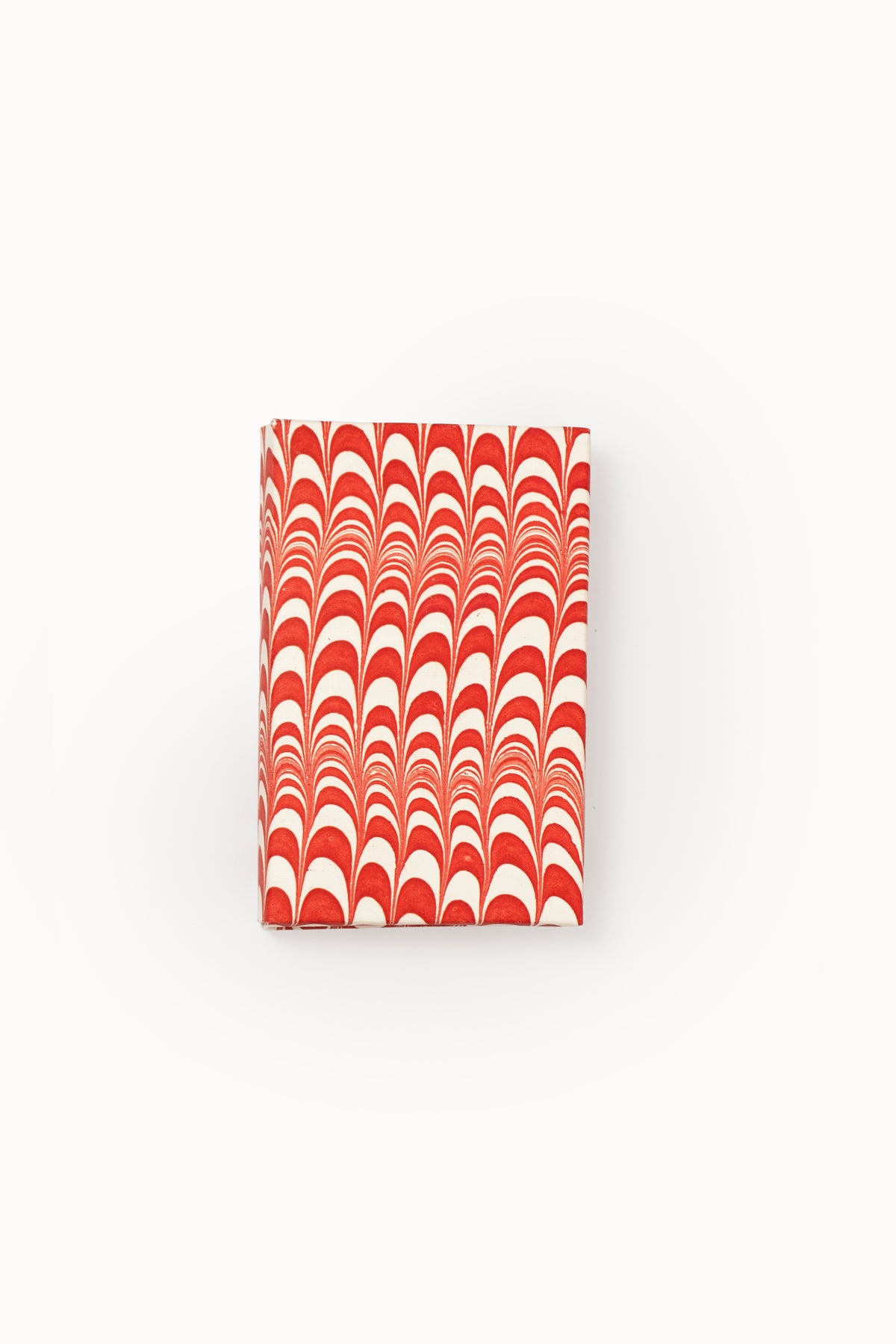 Single red and white swirled hand-marbled notecard from Inner Child