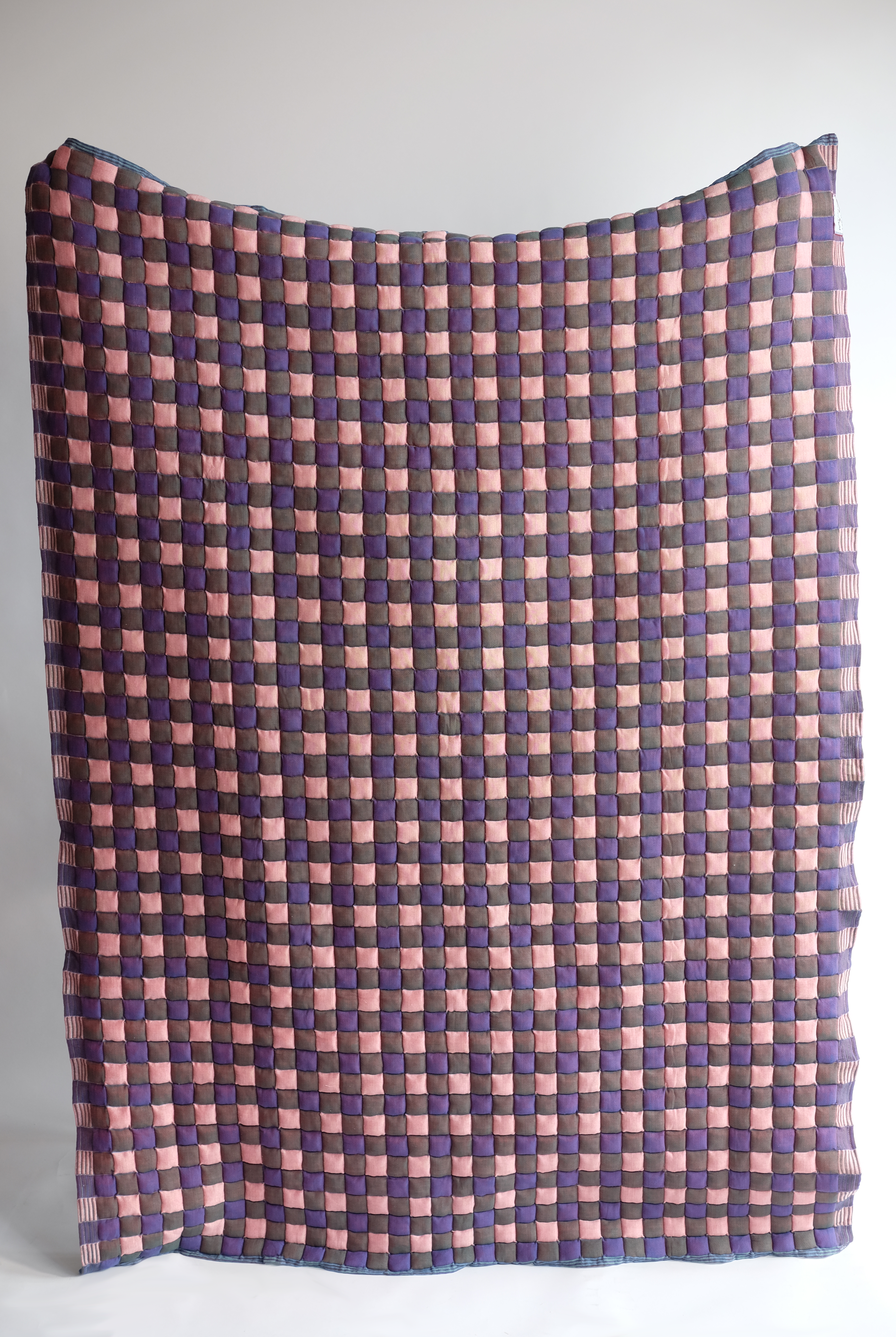 Pink brown purple checkered reversible Sujani quilt5. Close-up view of blue and green checkered Sujani quilt fabric