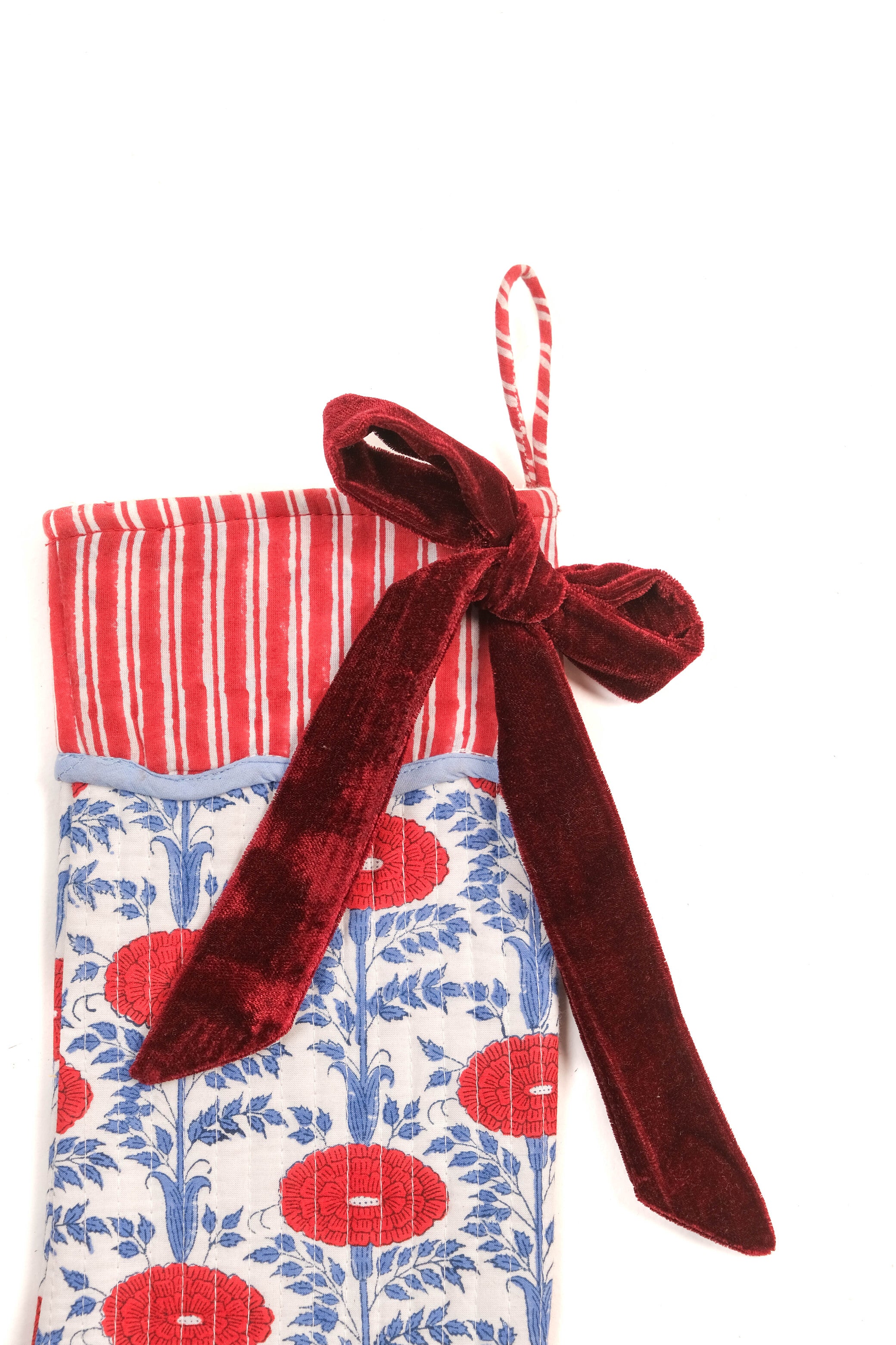 Inner Child Araminta Red blockprint stocking close-up with red flowers and blue foliage