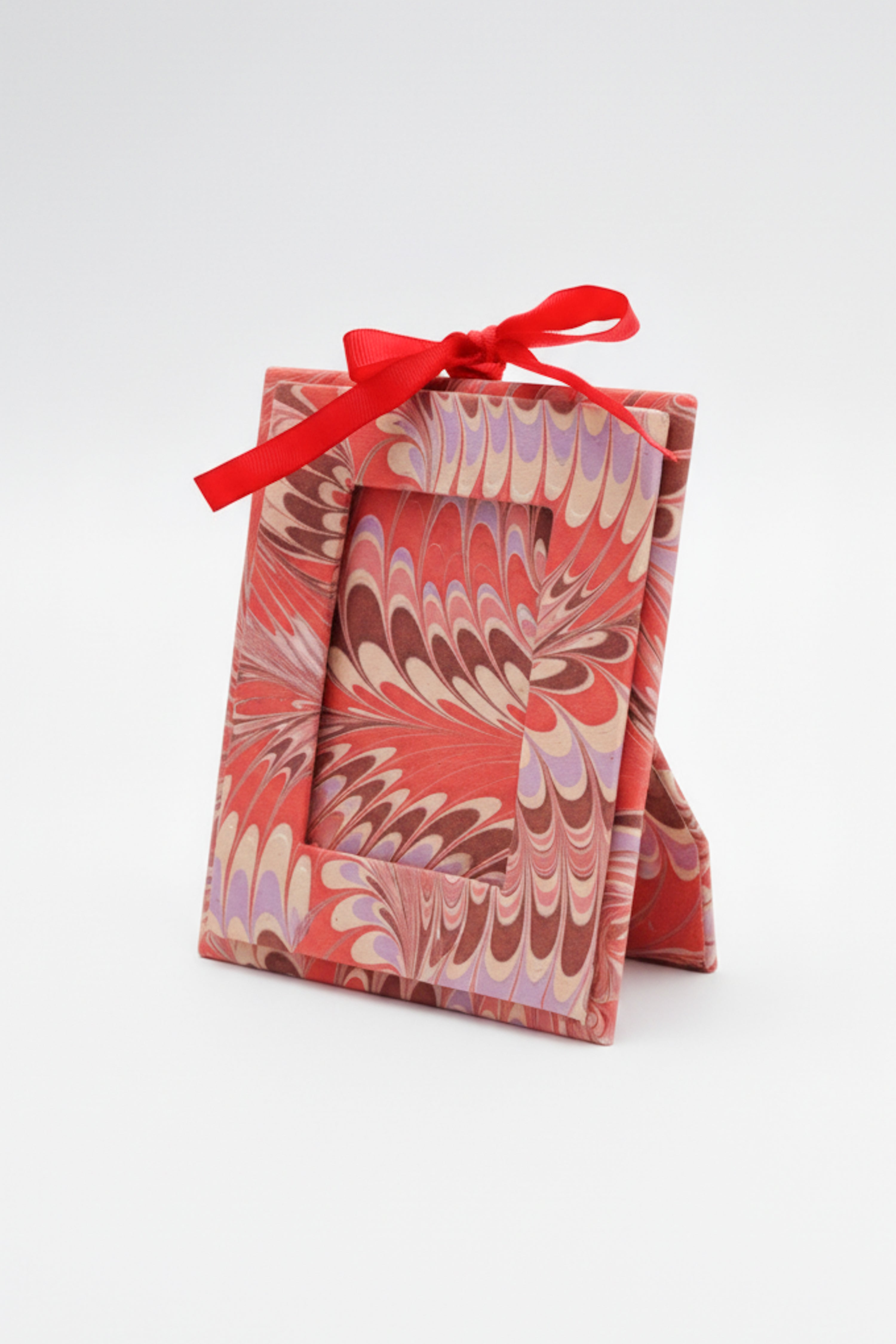 Standing hand-marbled mini picture frame ornament with florentine pink marbling patterns, Inner Child