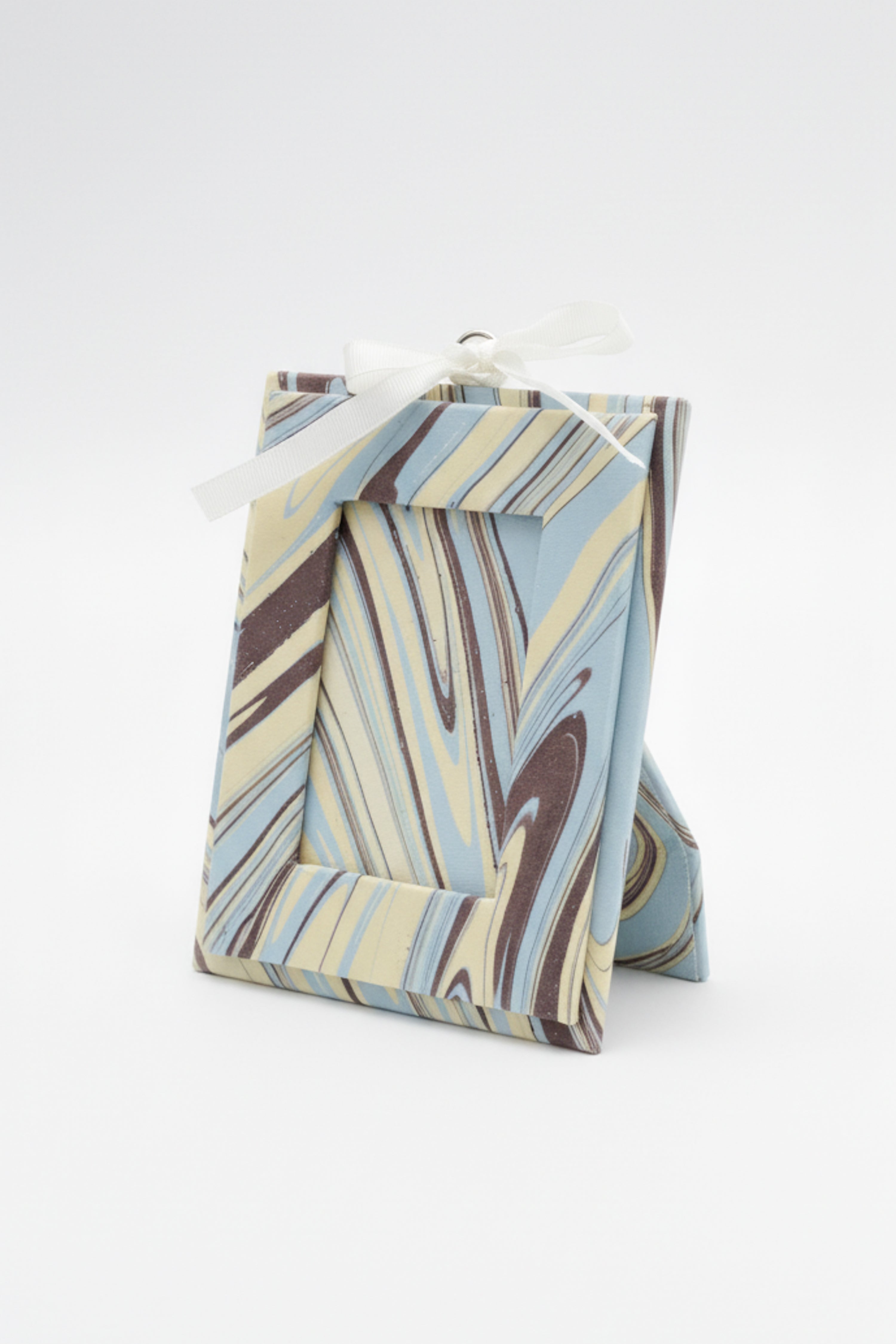 Mini hand-marbled Kyoto picture frame ornament with blue beige brown swirls & white ribbon