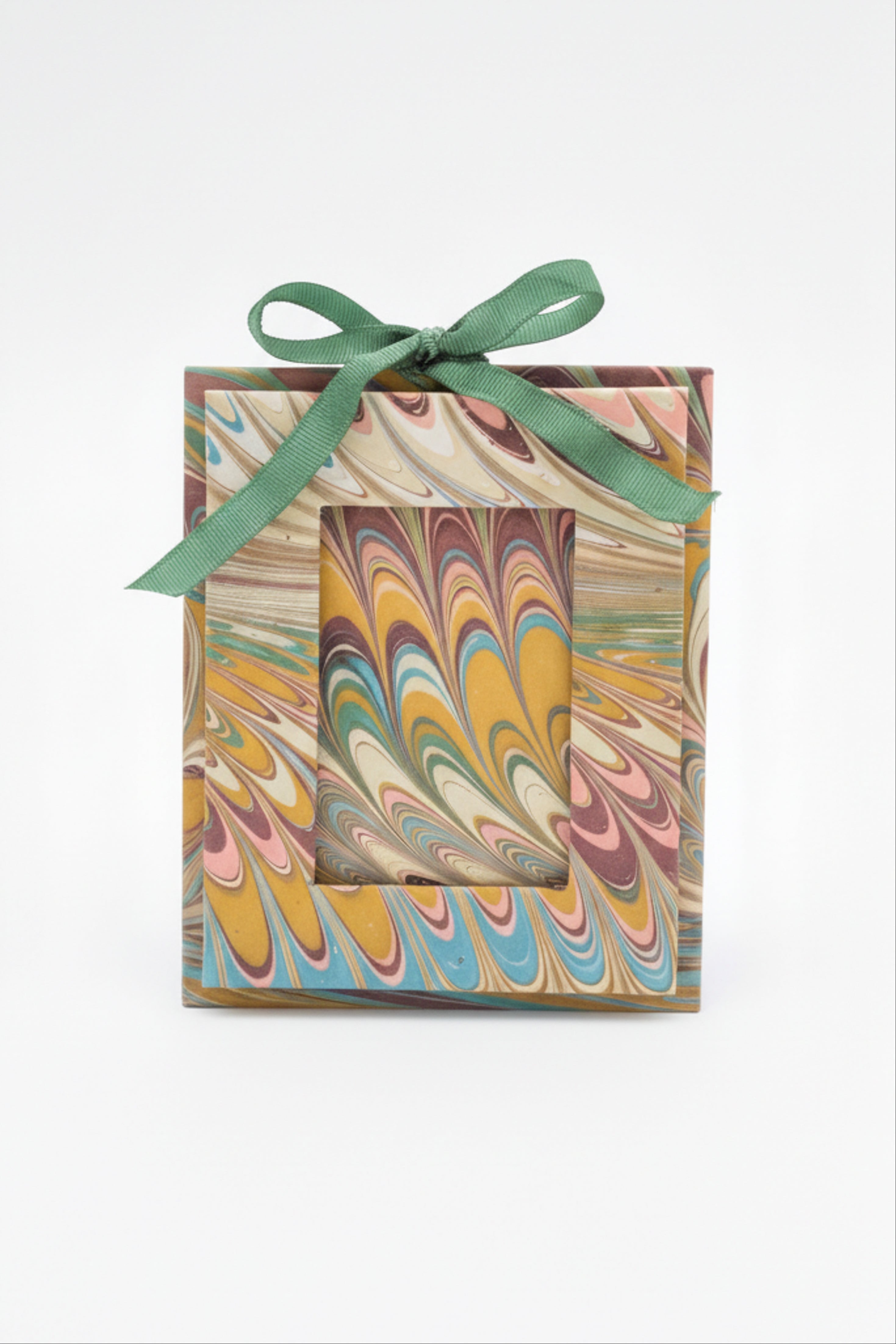 Mini hand-marbled picture frame ornament with green ribbon bow