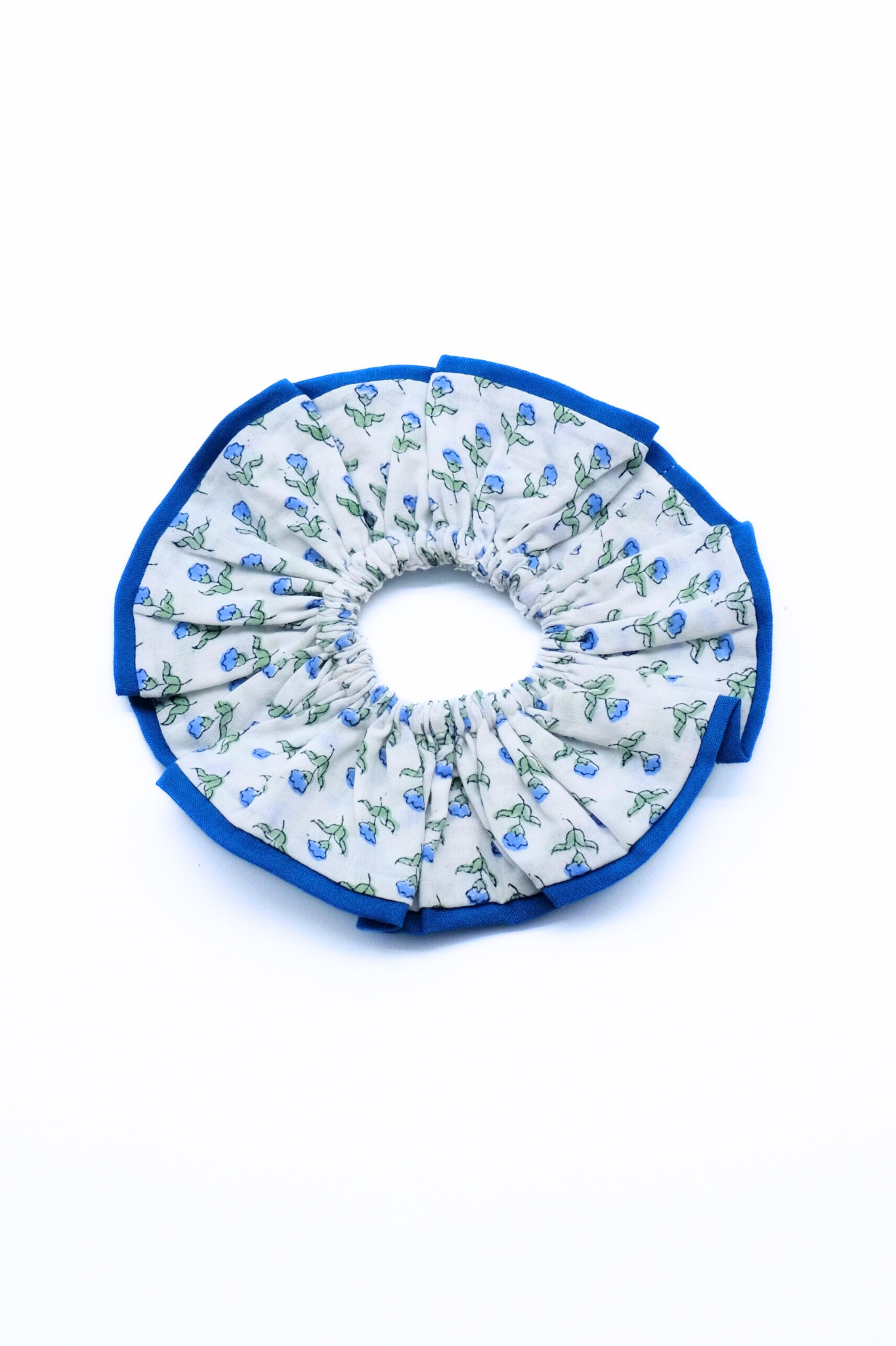 Blue-edged Maine block print scrunchie with delicate blue floral prints