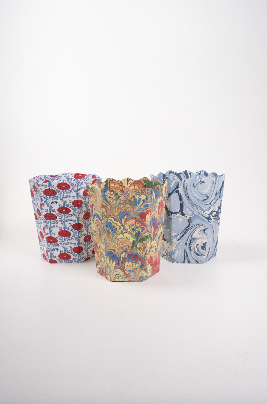 Three hand-marbled scallop waste bins in varied patterns - Inner Child