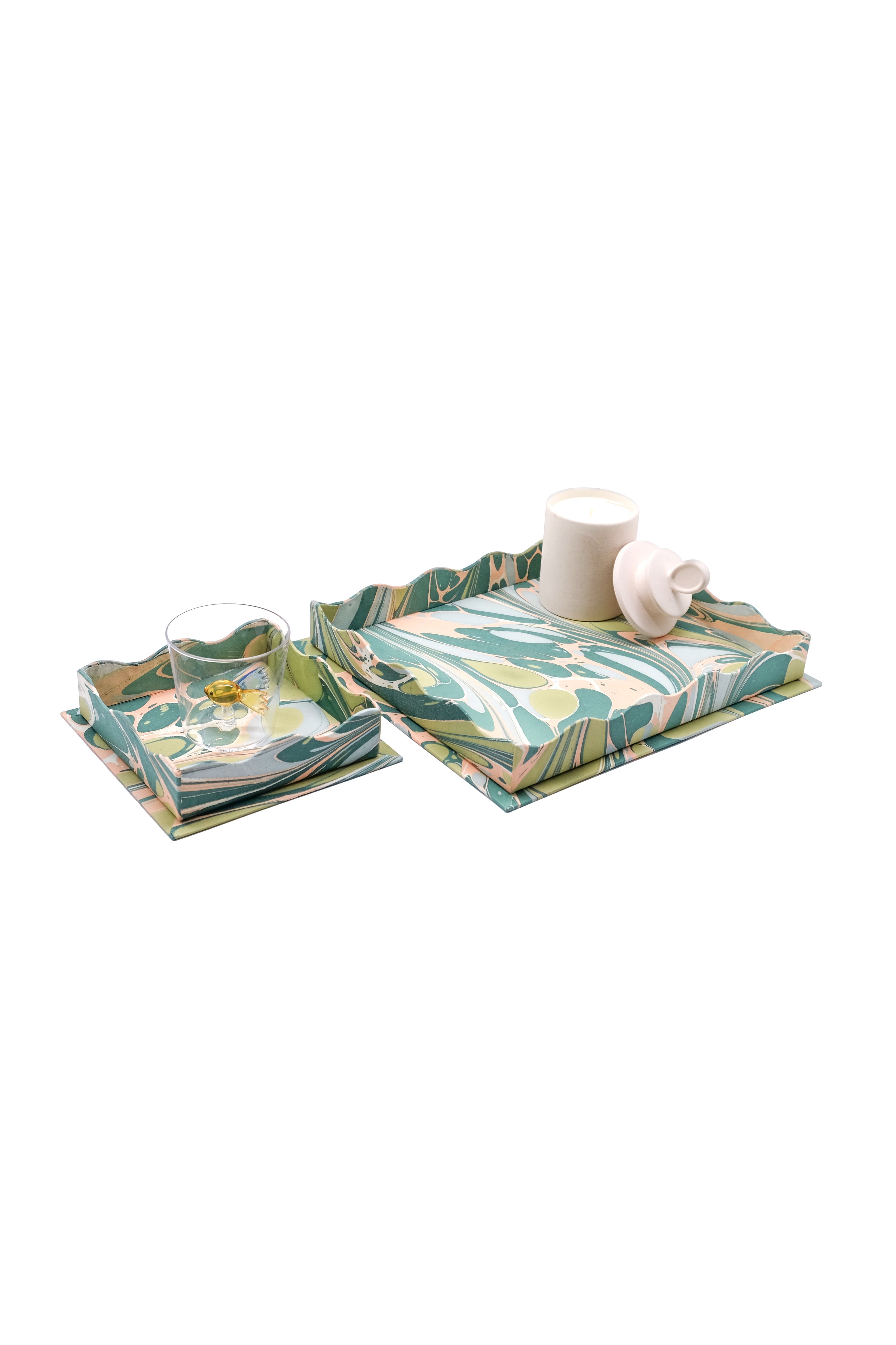 Inner Child nesting scalloped hand-marbled green pink trays with decor items