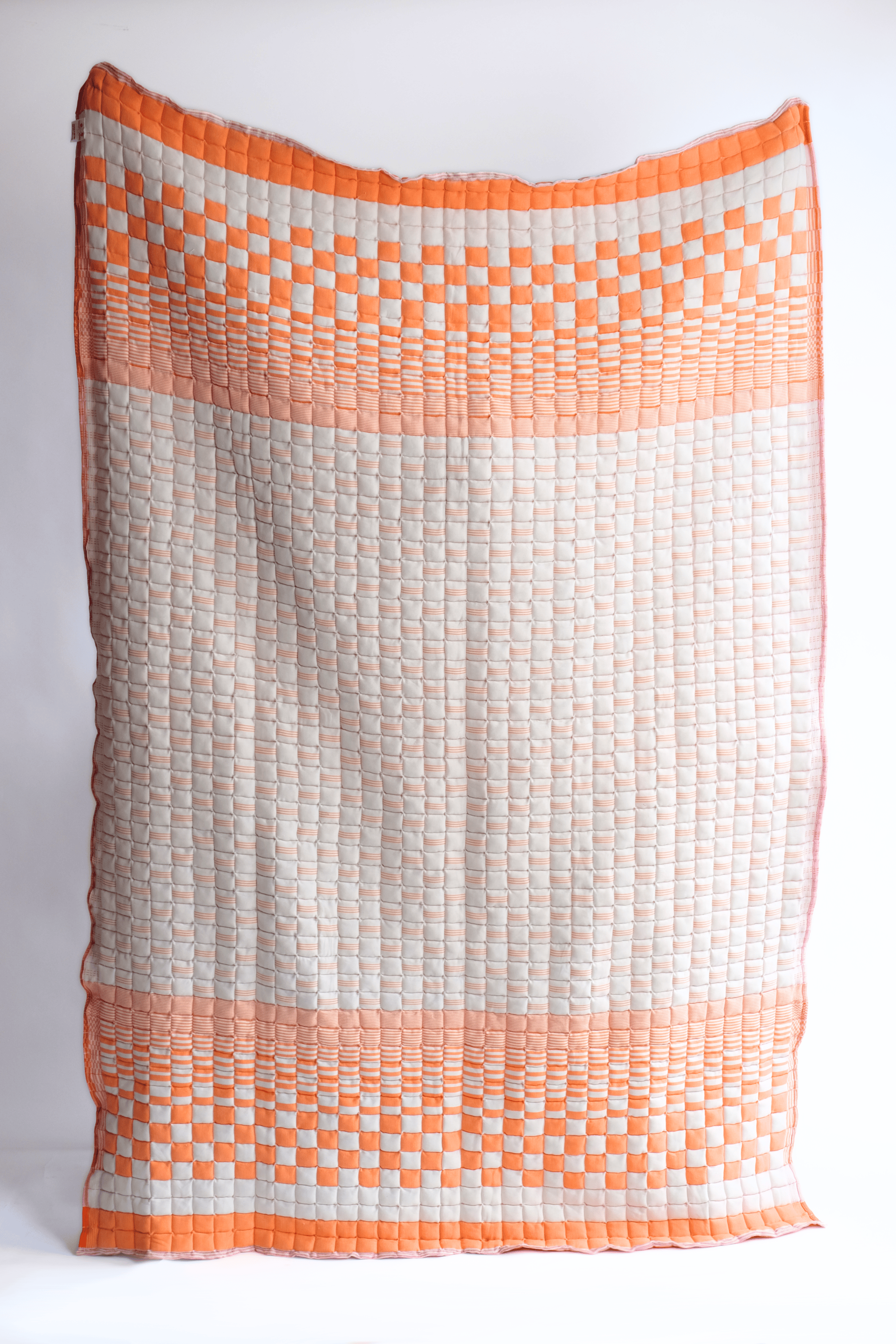 Bold orange reversible sujani quilt with square pattern - Inner Child
