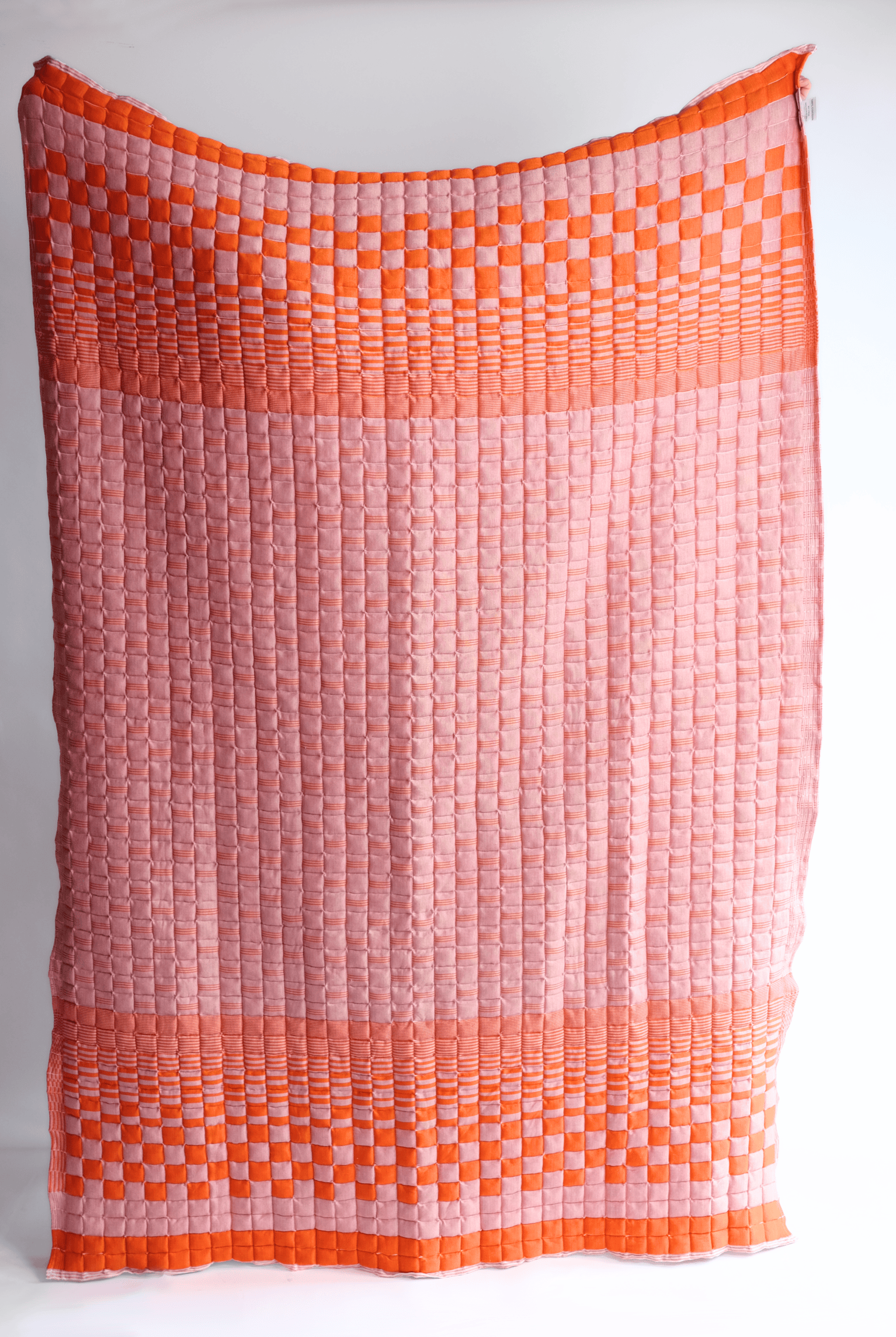 Bold orange and pink reversible sujani quilt with square pattern - Inner Child