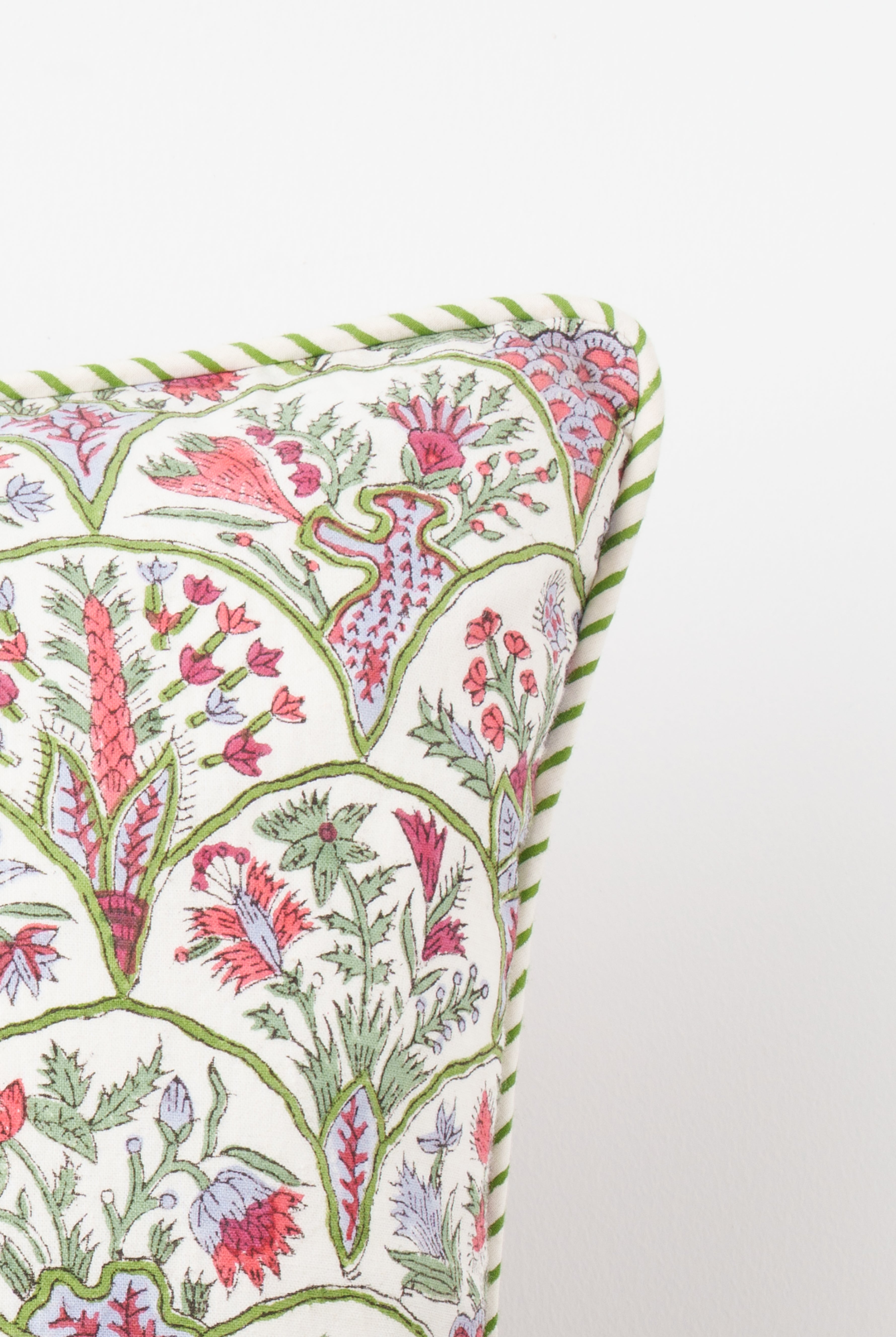Pink arch blockprint reversible decorative pillow with colorful floral patterns