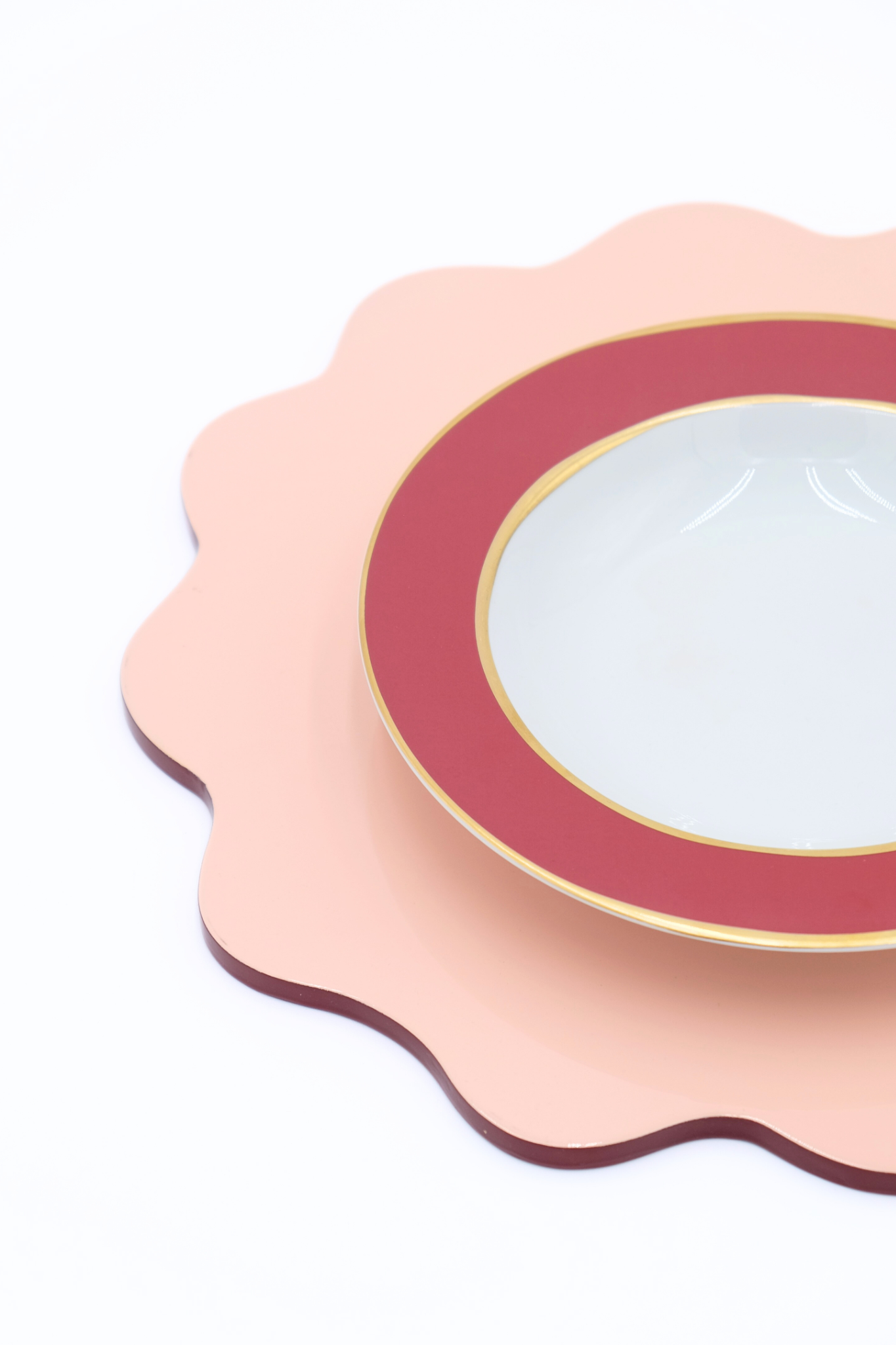 Blush pink scalloped lacquerware placemat set with red-rimmed plate - Inner Child
