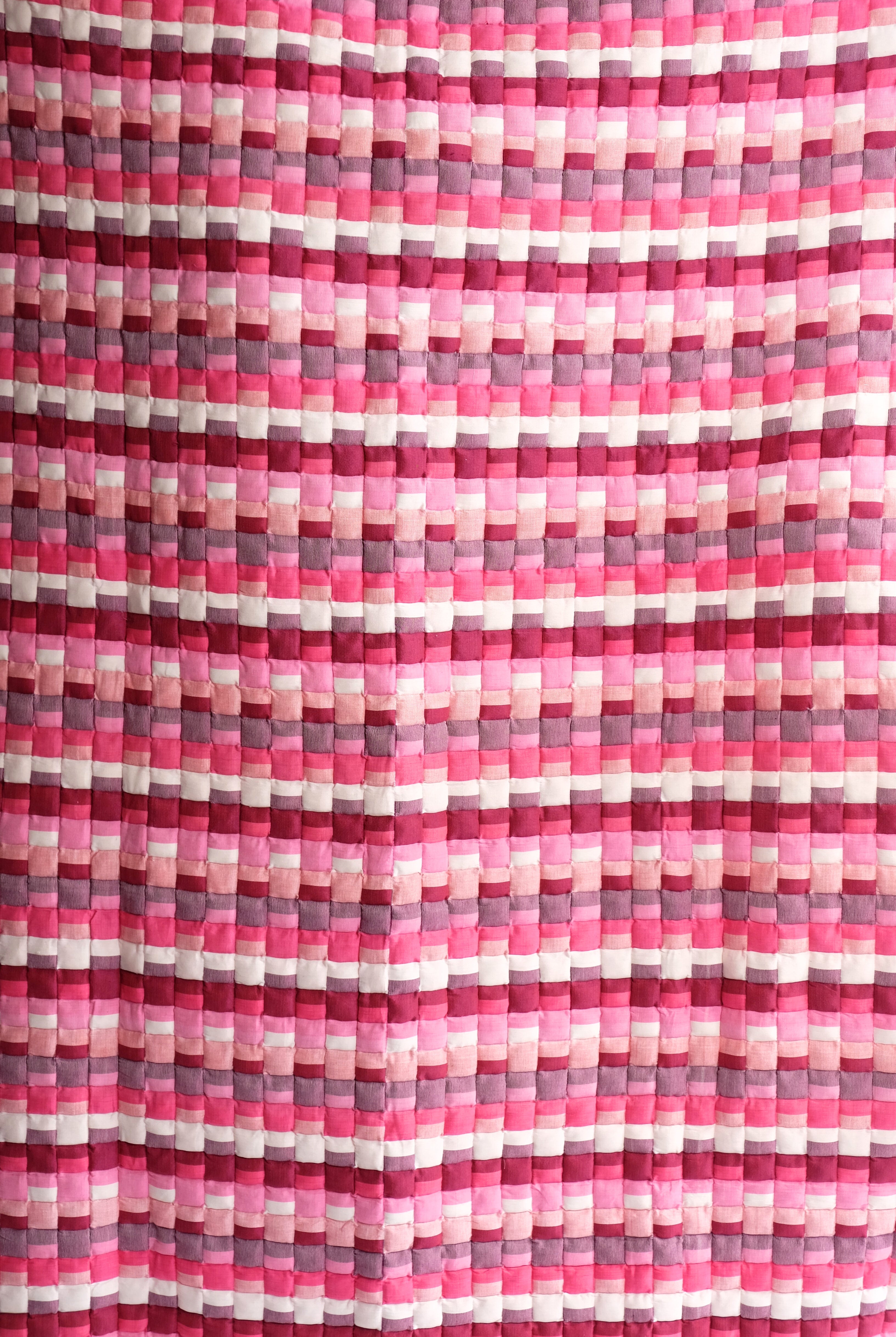 Close-up of Pink Tetris quilt's block pattern detail