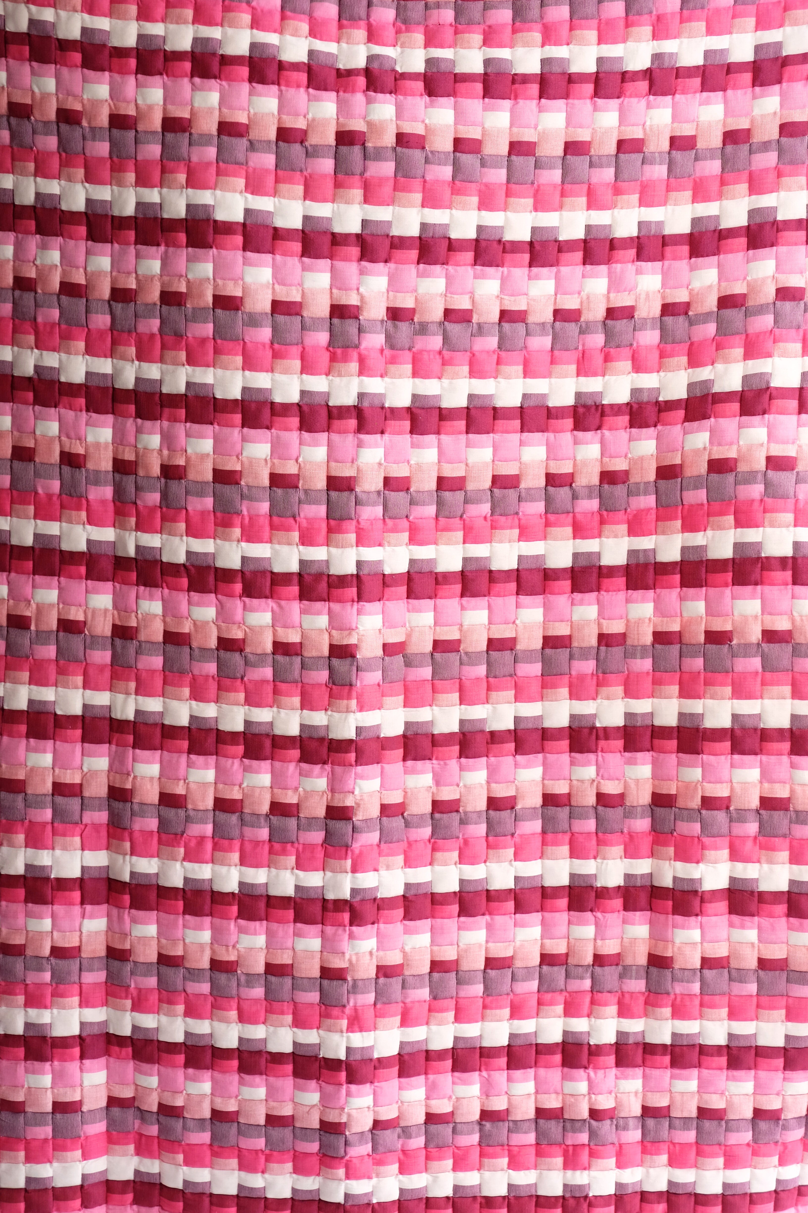 Close-up of Pink Tetris quilt's block pattern detail