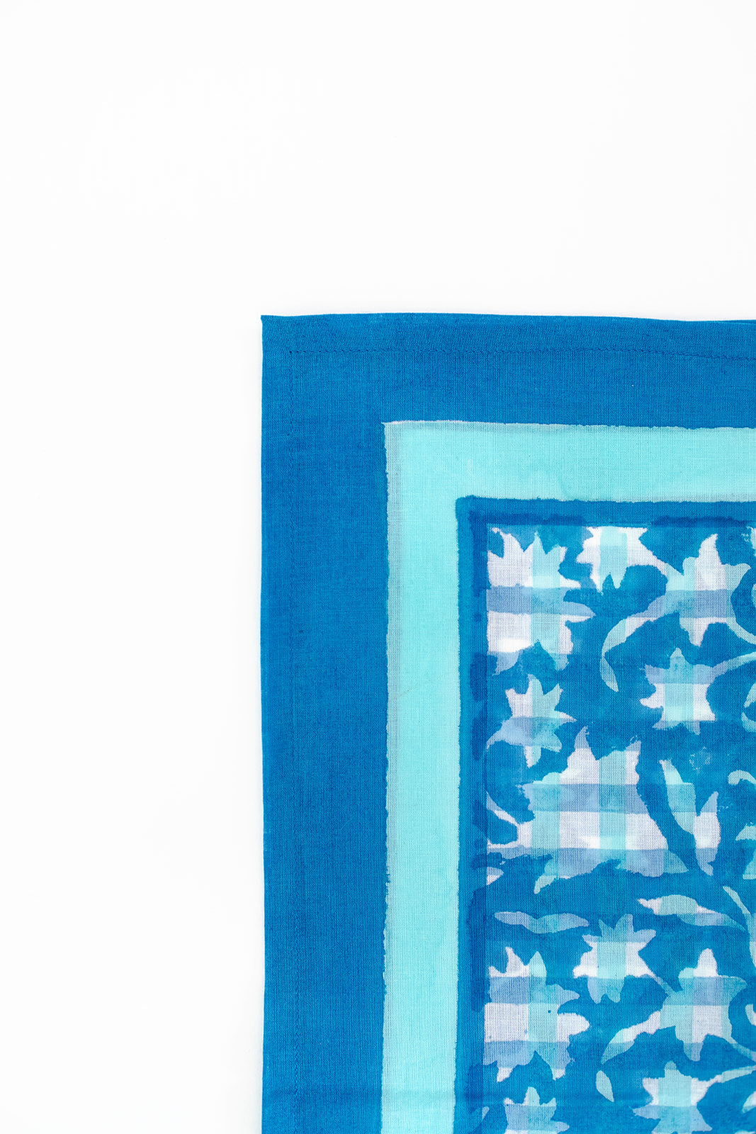 Corner view of blue organic cotton blockprint scarf with layered borders, Inner Child