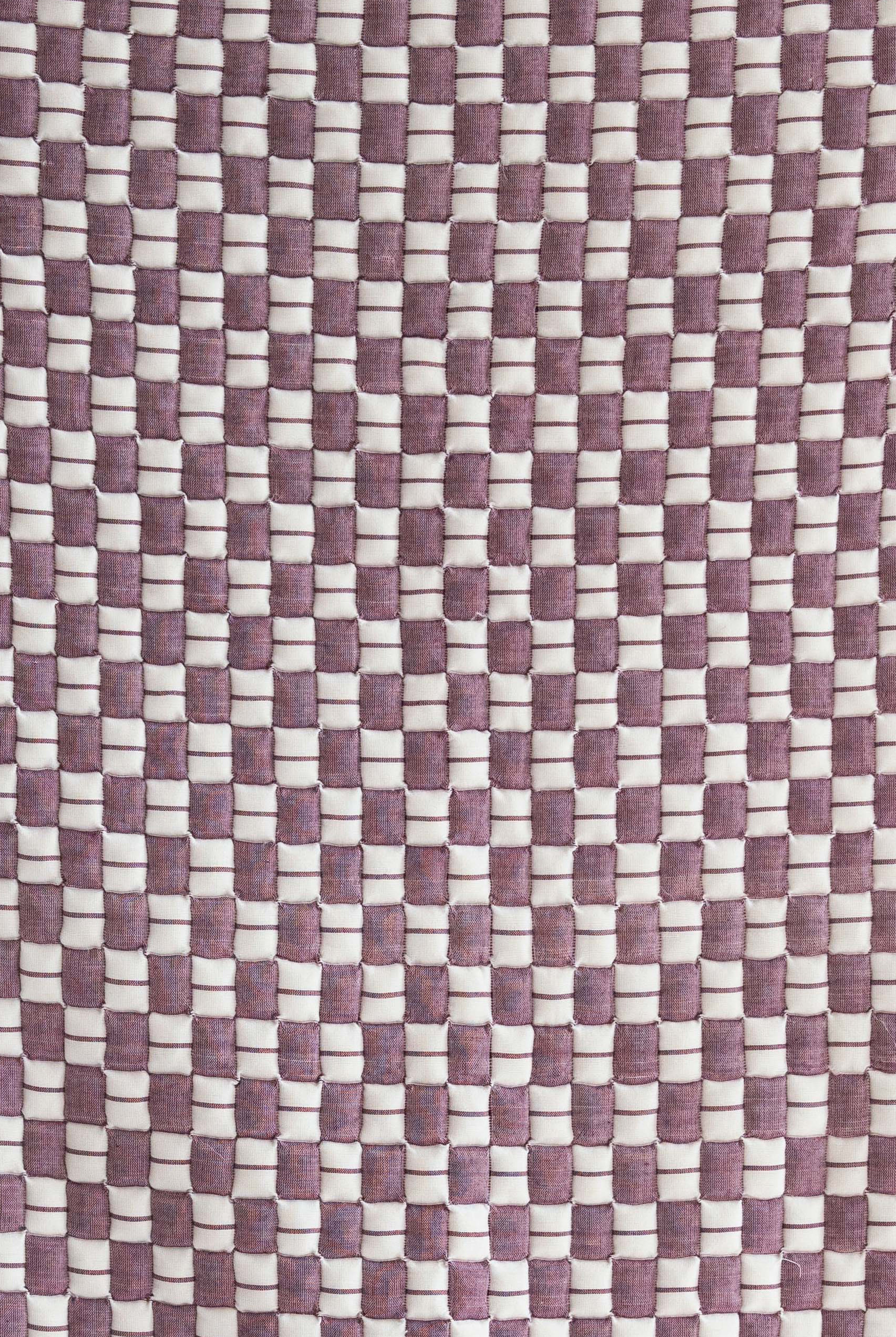 Close-up of purple and white checkered Sujani quilt pattern - Inner Child