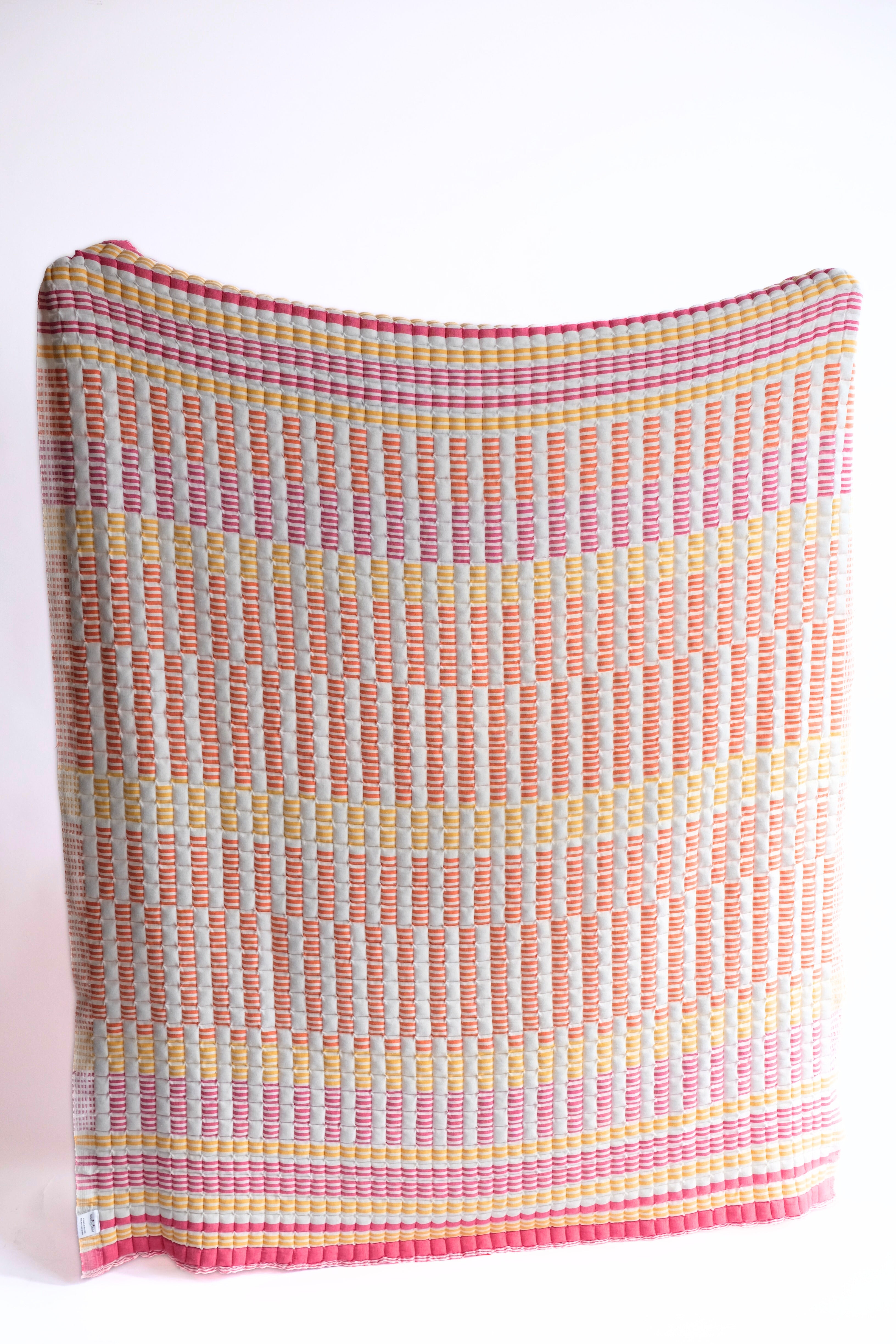 Colorful striped sunset sujani quilt from Inner Child
