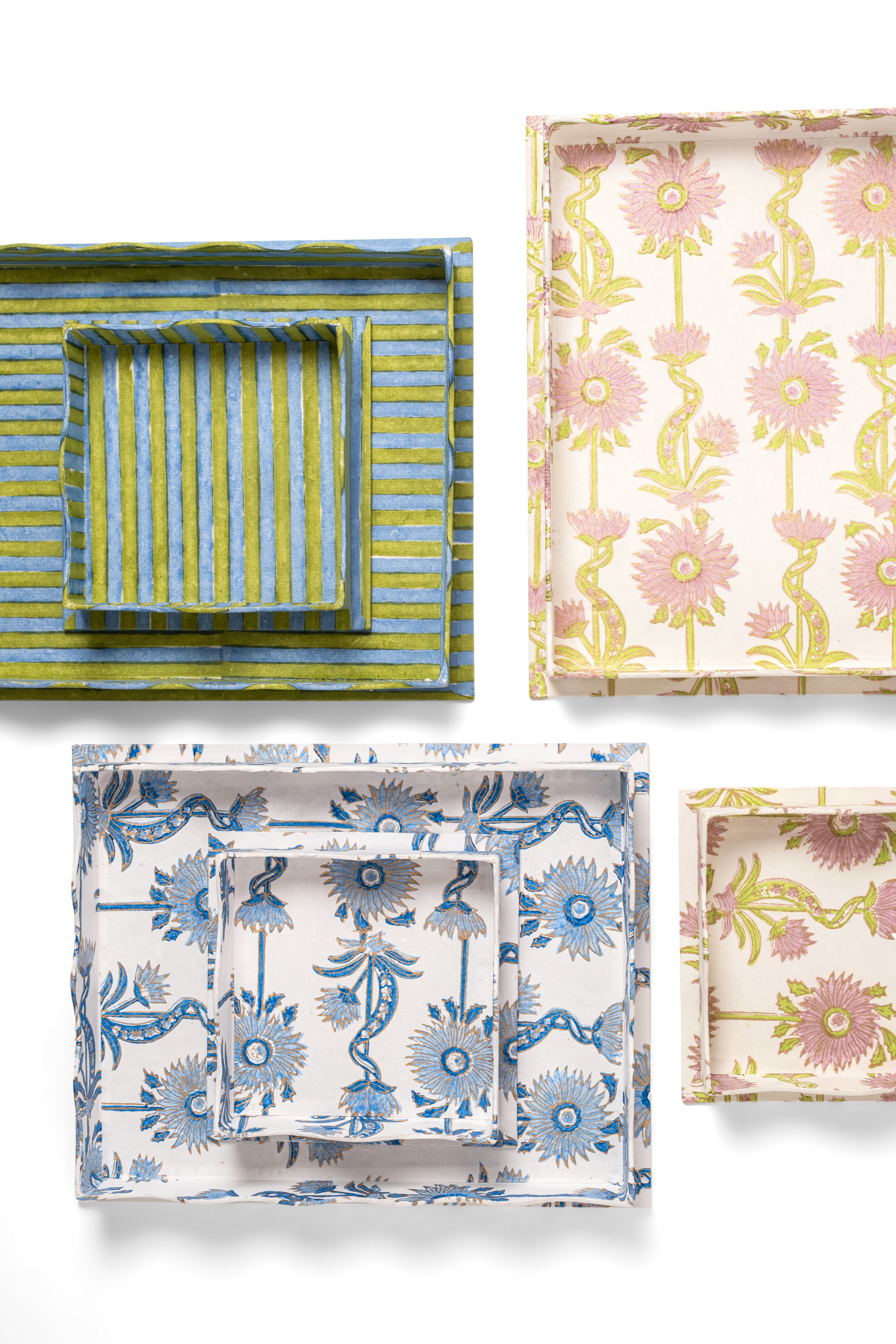 Multi-pattern nesting scalloped blockprint trays in green blue and floral designs