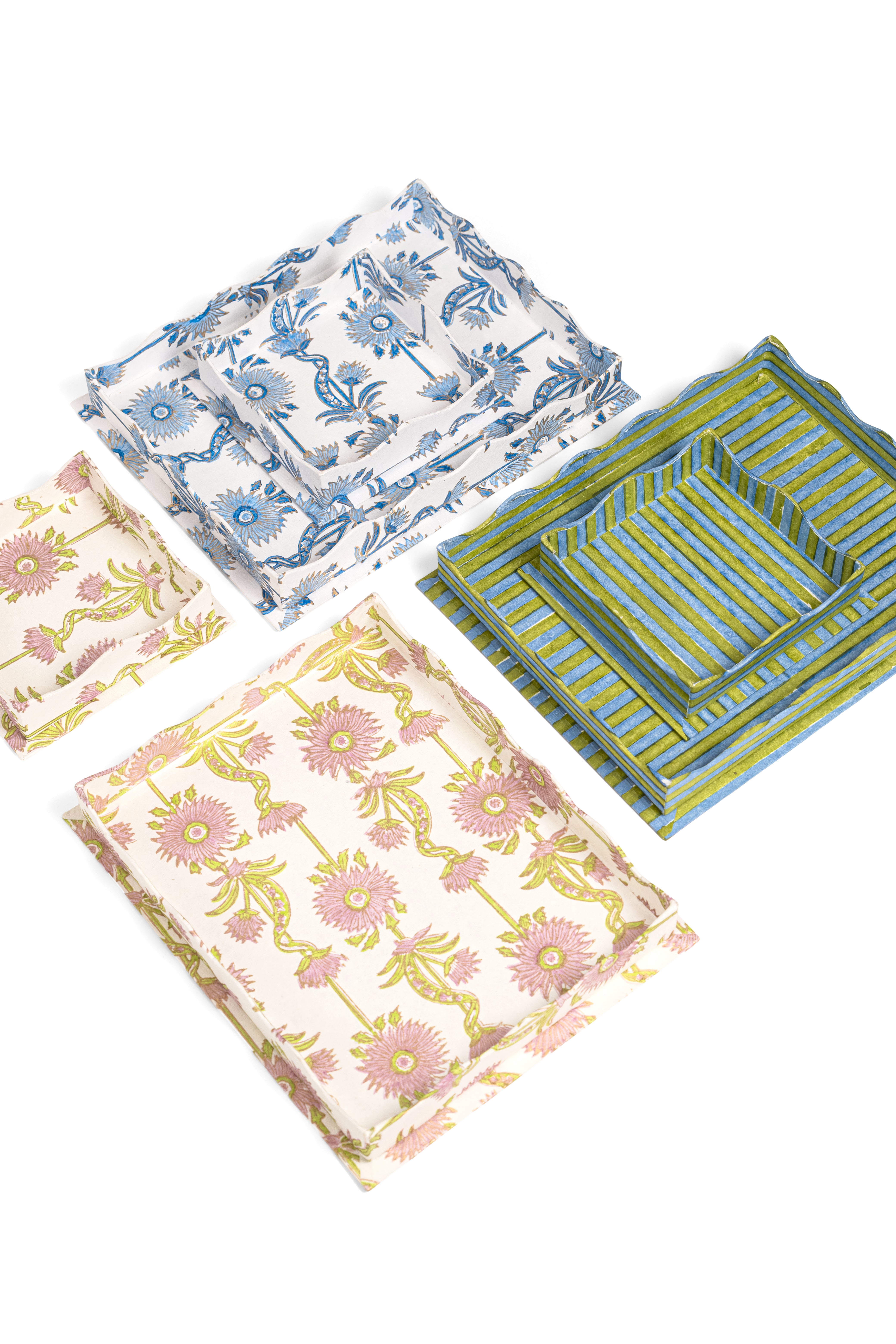 Assorted nesting scalloped blockprint trays featuring green-blue and floral patterns