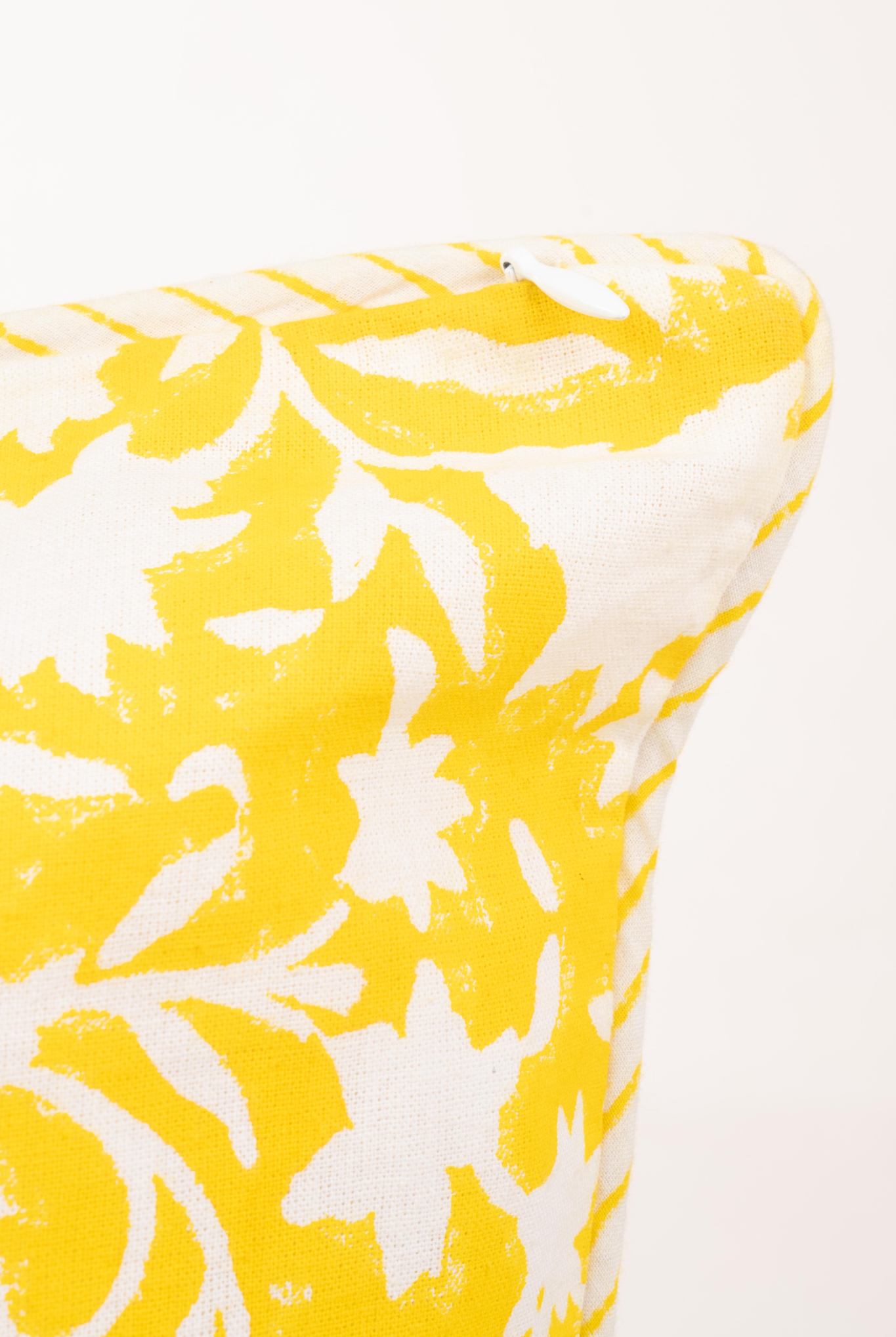 Inner Child saffron yellow pillow close-up showing blockprint detail