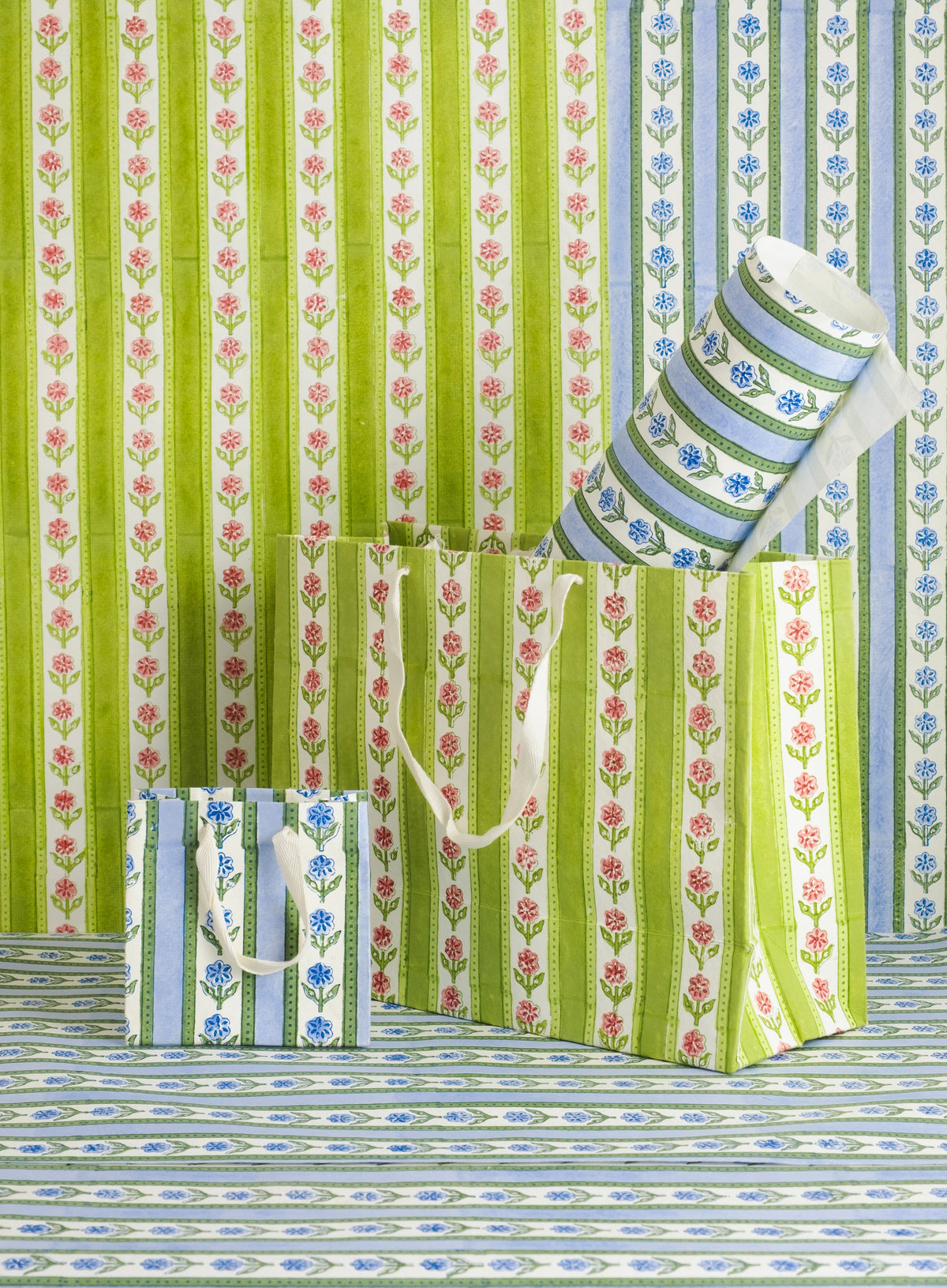 Cottage Garden blockprint gift bags in blue and green stripes with wine bottle bag on striped fabric