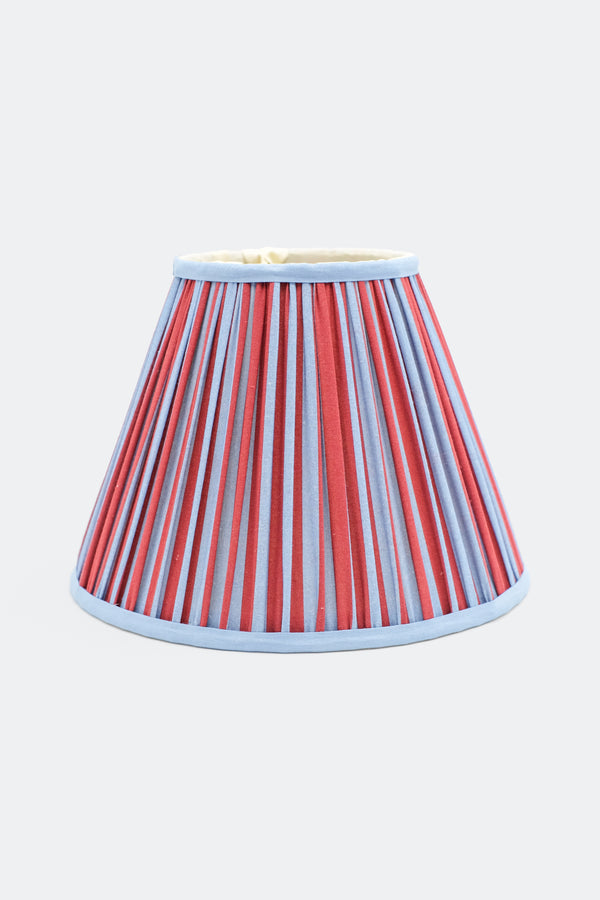 10-inch pleated empire lampshade with Red and Blue Stripes pattern, light blue trim, front view