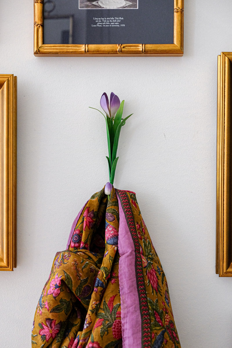 Crocus wall hook with colorful floral fabric, golden frames