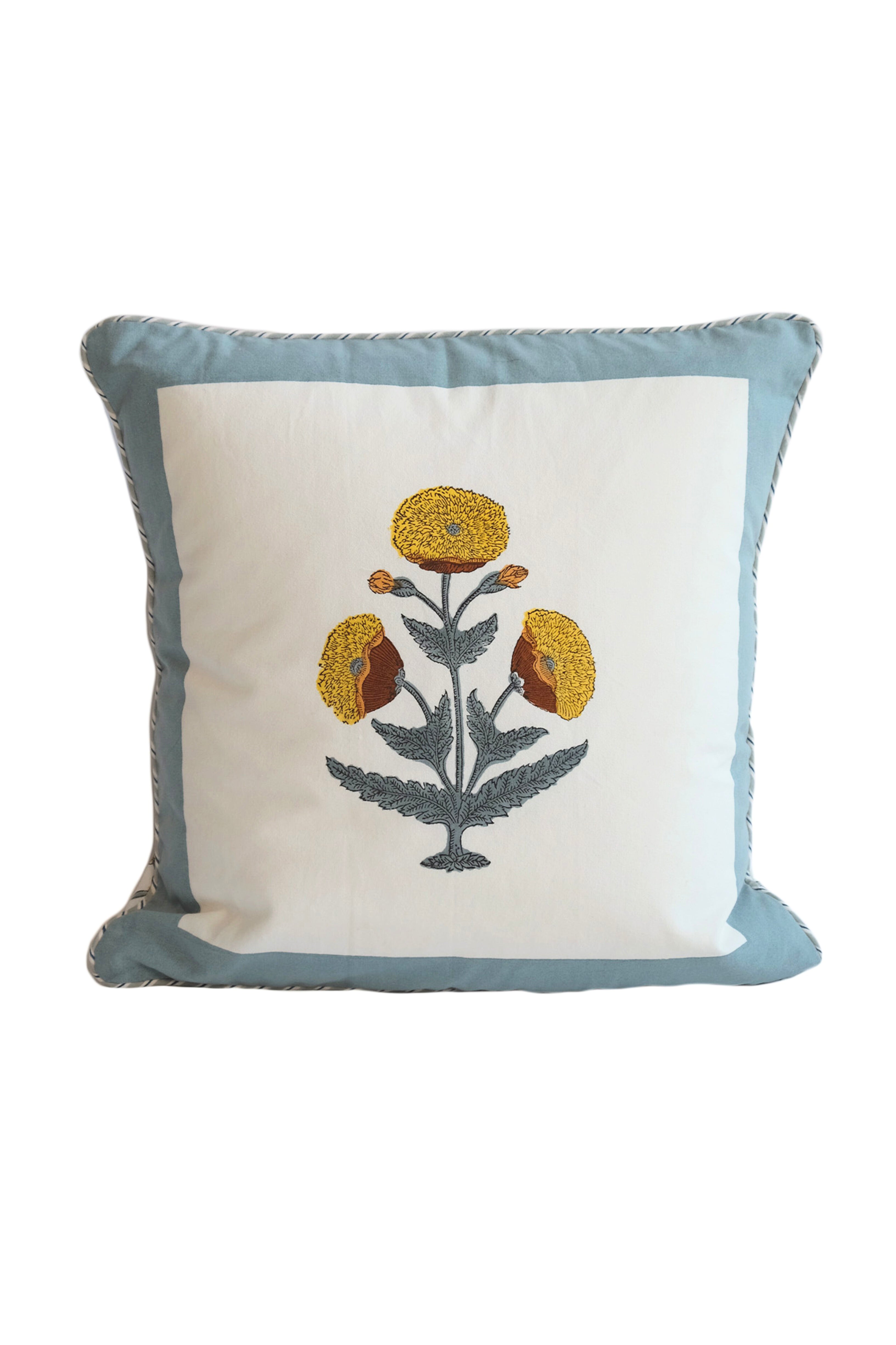 Blue poppy blockprint pillow featuring yellow flowers and gray leaves