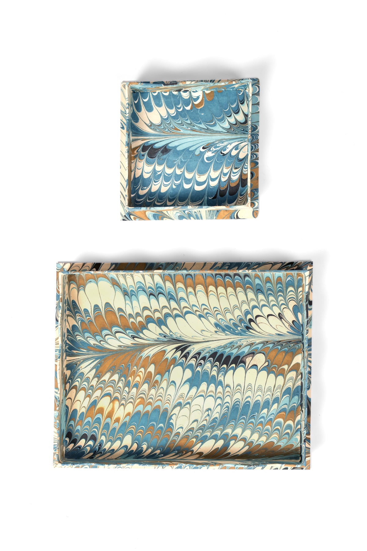 Inner Child trinket cocktail napkin tray with blue, beige marbled patterns in Nila Feathers design