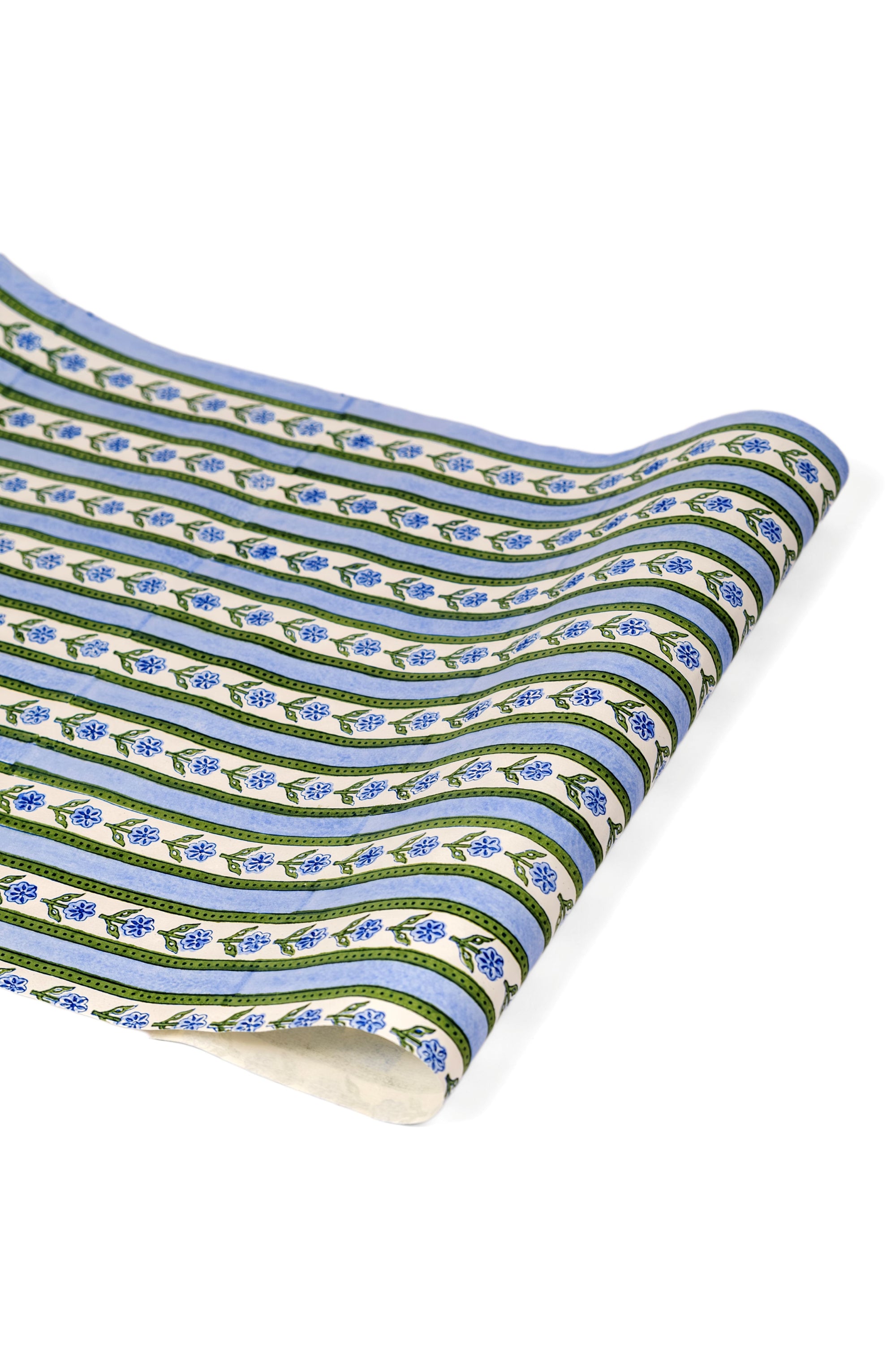 Single blue blockprint cottage garden gift wrapping paper sheet with floral patterns