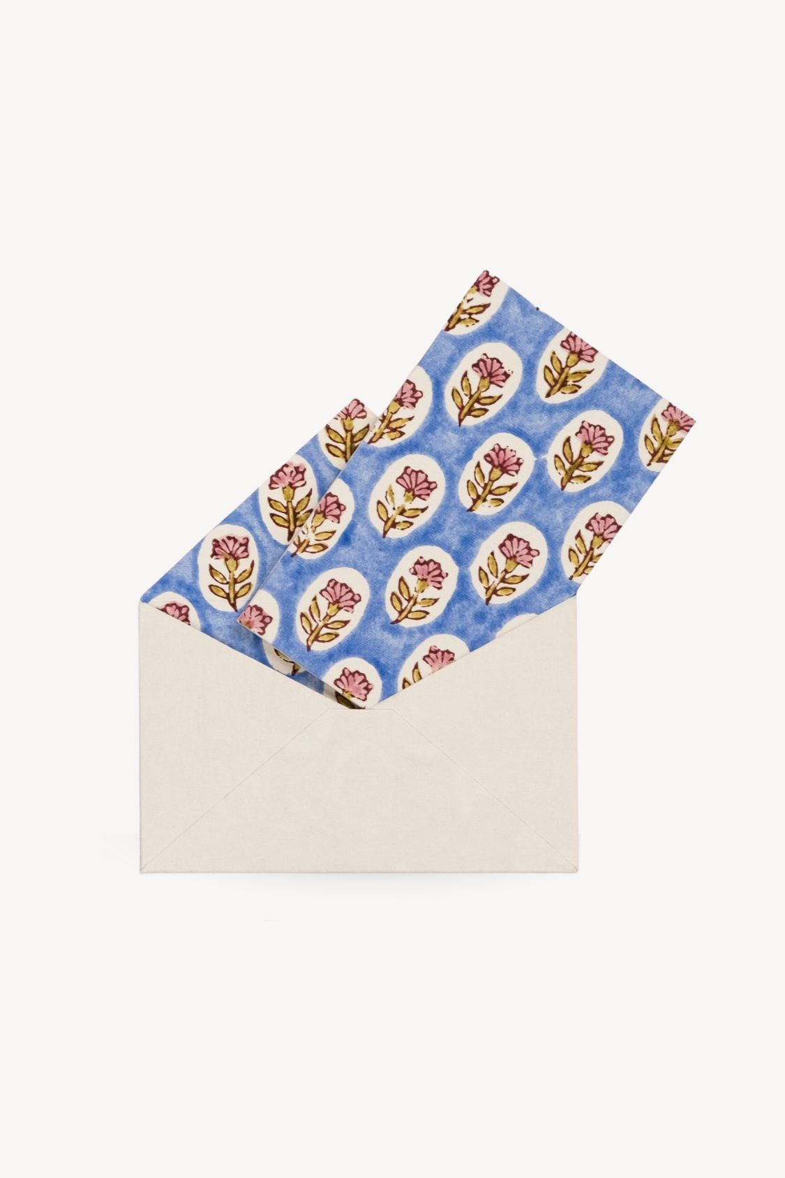 Envelope containing blue daisy blockprint notecard from Inner Child