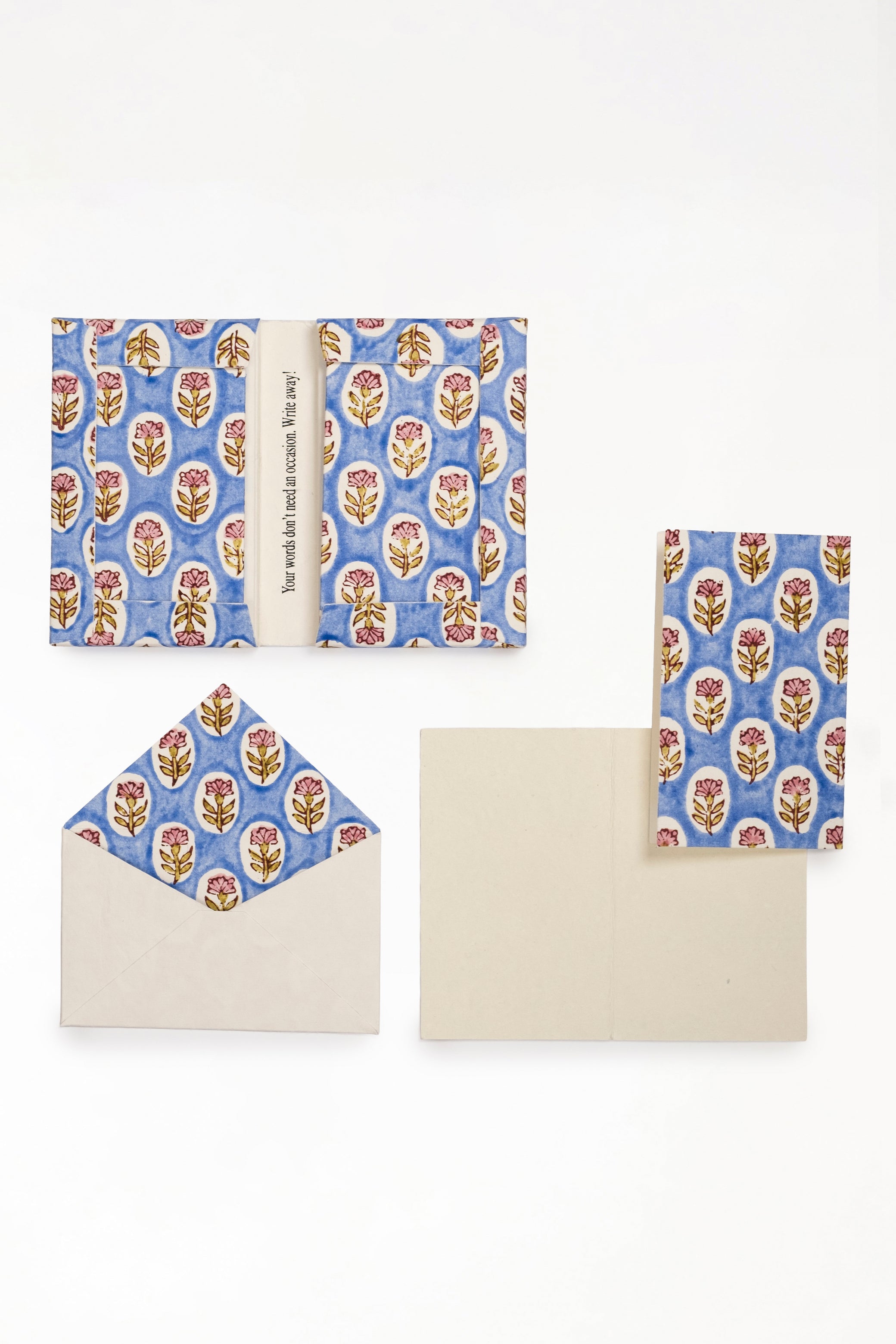 Blue daisy blockprint notecards set with envelopes displayed on white background