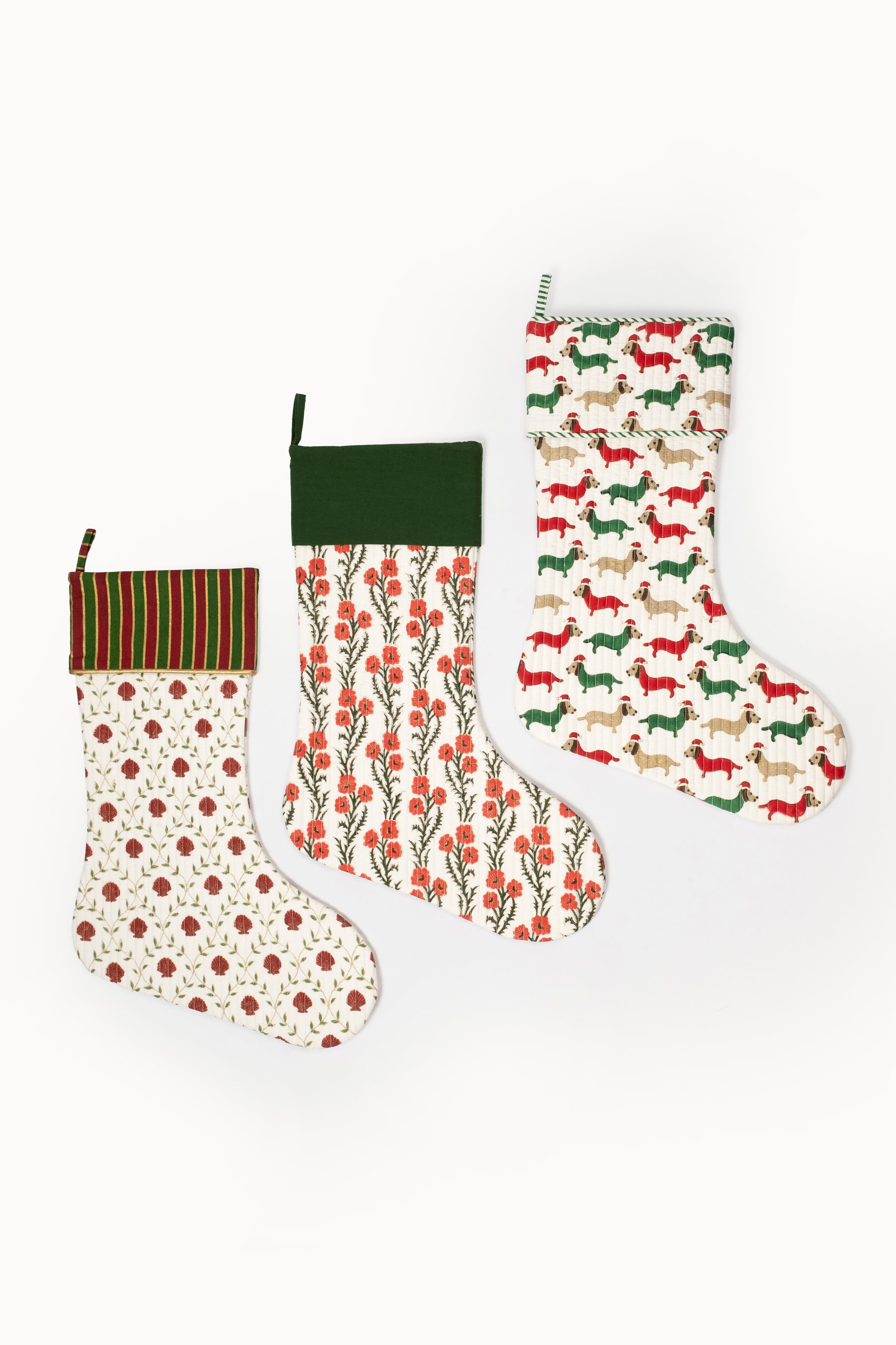 Blockprint stocking with red floral pattern, green foliage, dark green cuff - Inner Child holiday collection