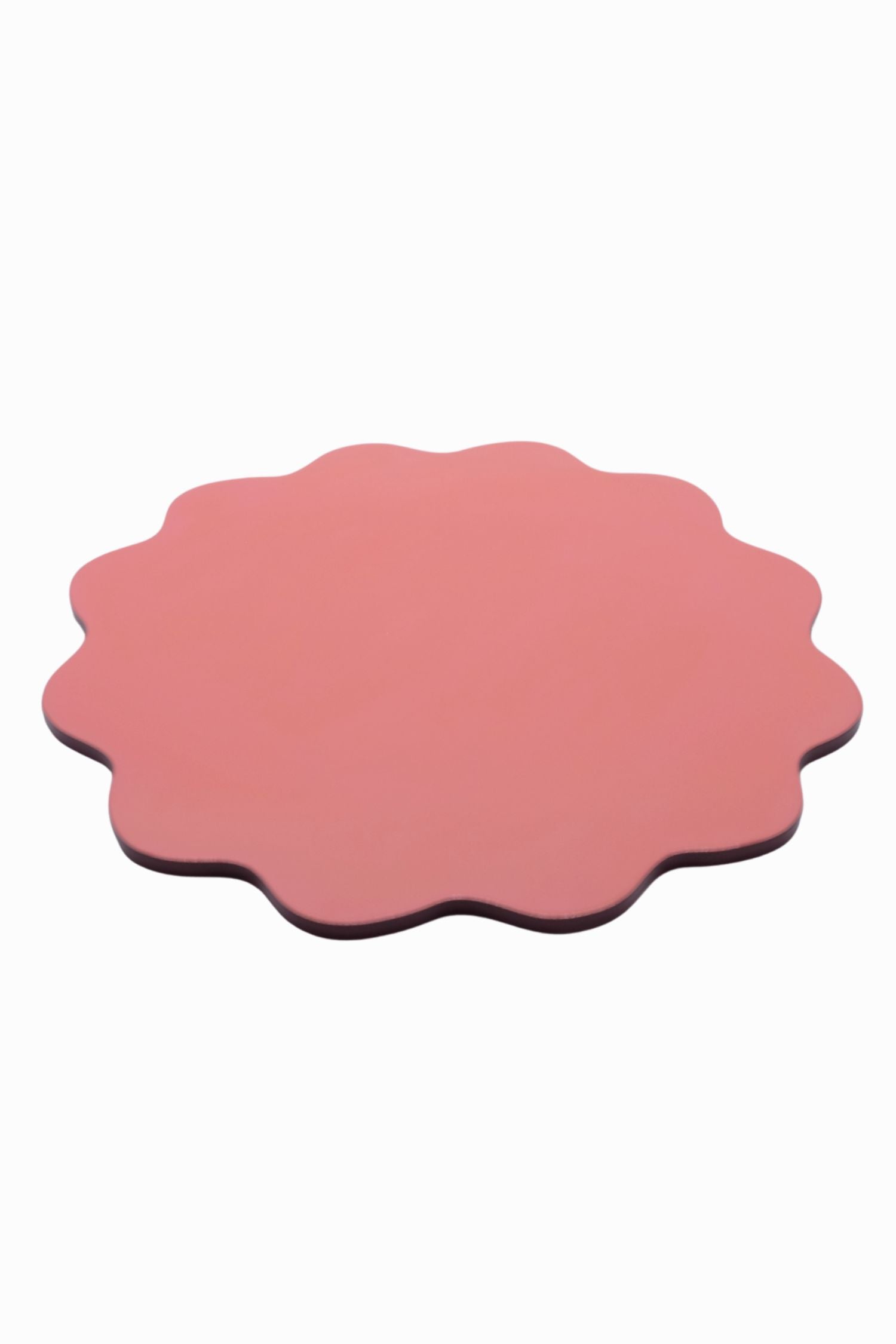 Blush pink scalloped edge placemat with smooth surface