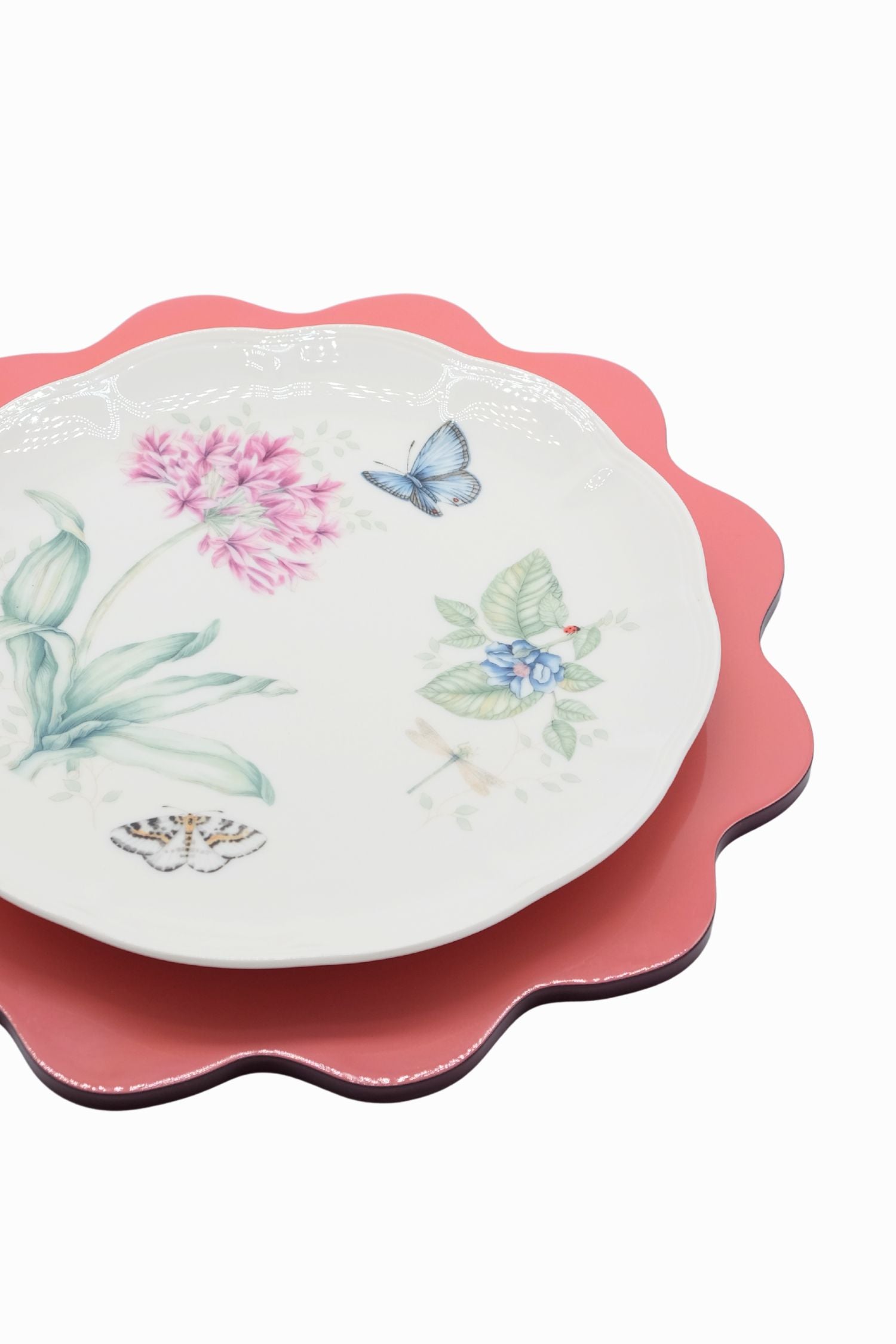 Inner Child blush pink scalloped lacquerware placemat set with detailed botanical illustrations