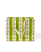 Medium green cottage garden blockprint gift bag with pink floral patterns and white handles