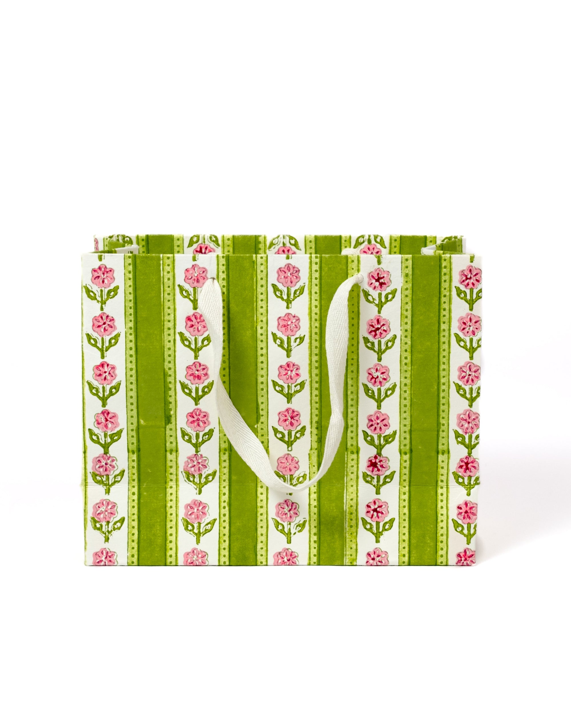 Medium green cottage garden blockprint gift bag with pink floral patterns and white handles