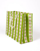 Large green cottage garden blockprint gift bag with pink flower patterns