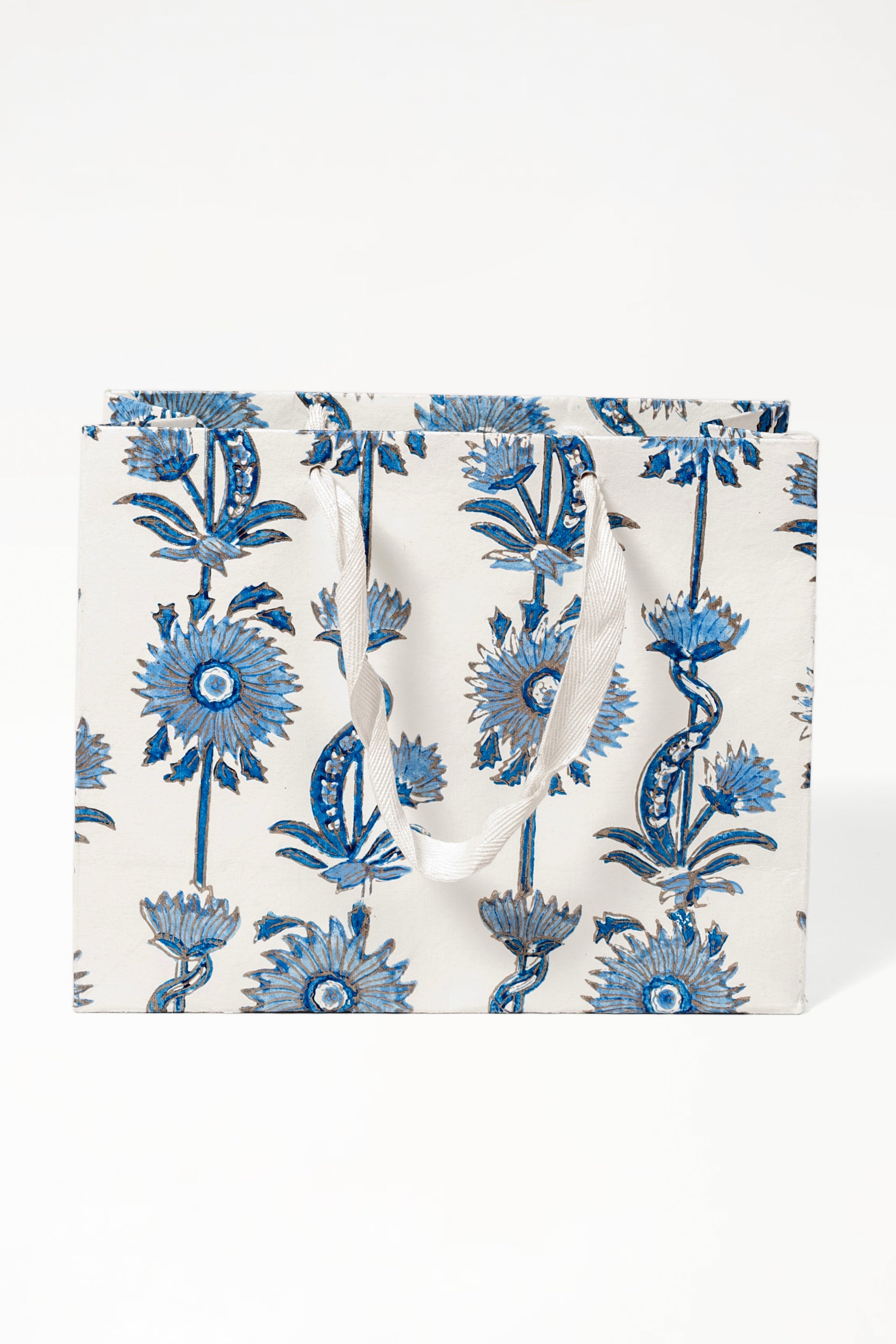 Medium blue floral vines blockprint gift bag with white handles from Inner Child
