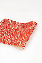Red and white hand marbled candy cane swirl gift wrapping paper sheet