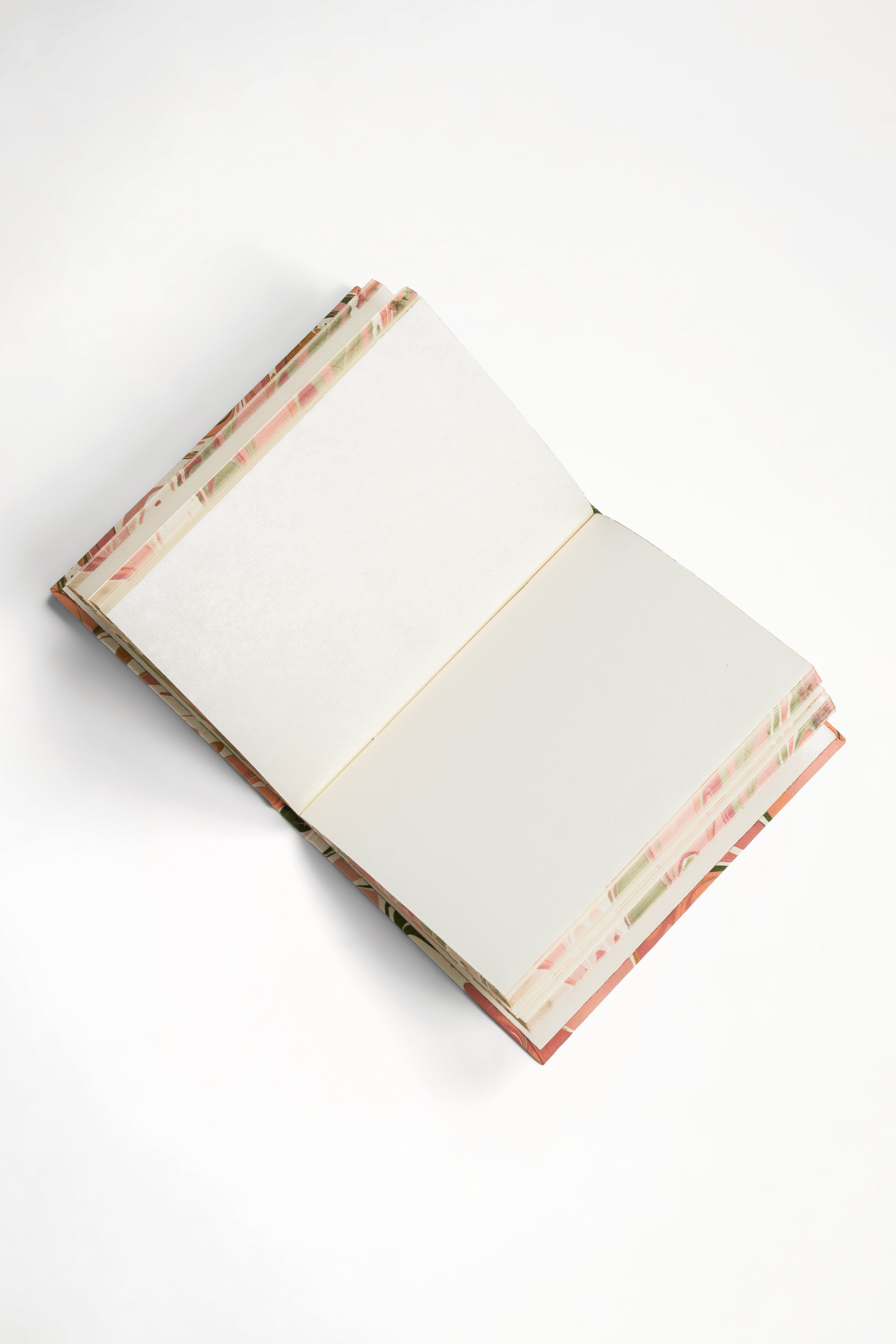 Open peony bloom hand-marbled notebook with blank pages