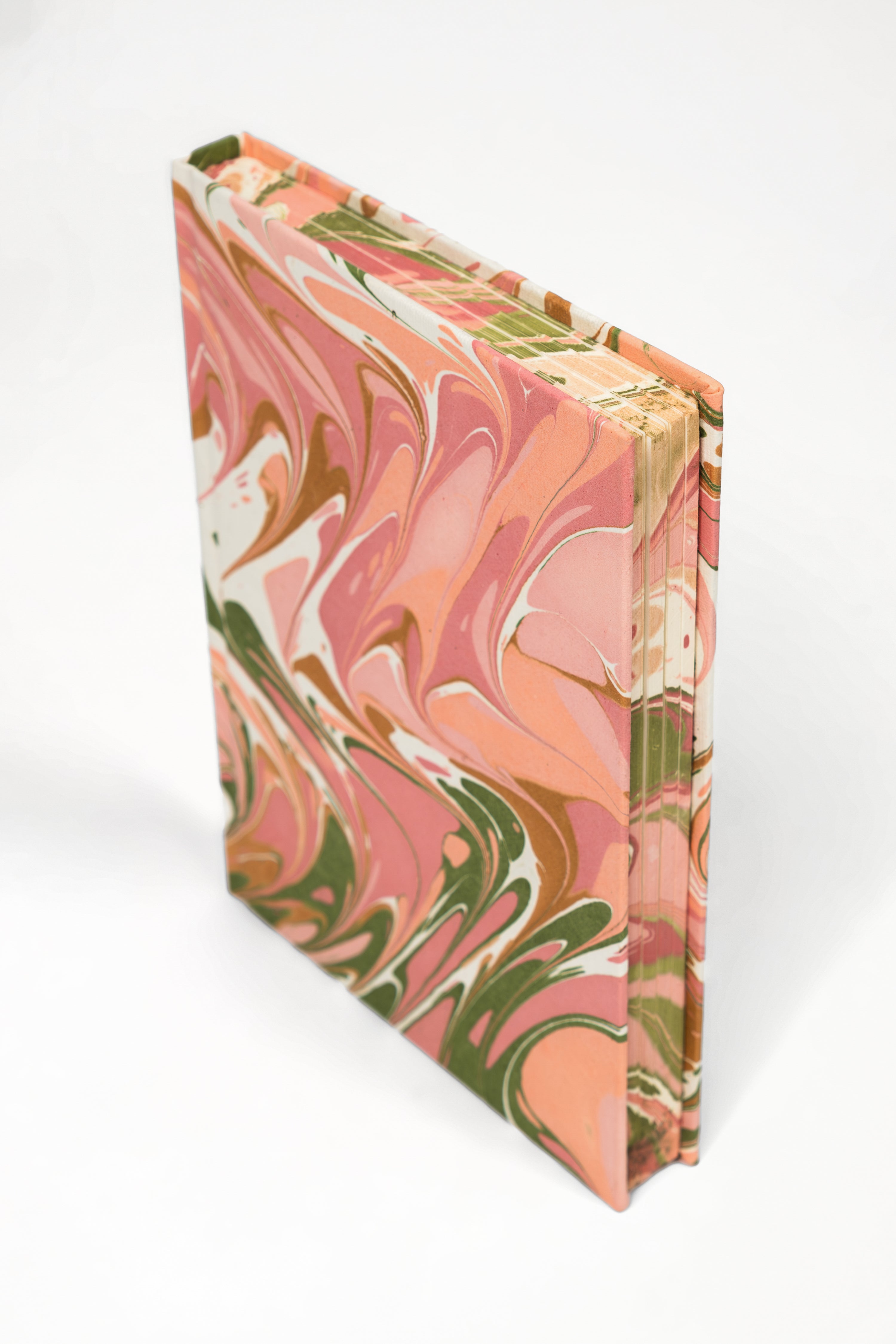 Peony bloom hand-marbled hardcover notebook standing upright